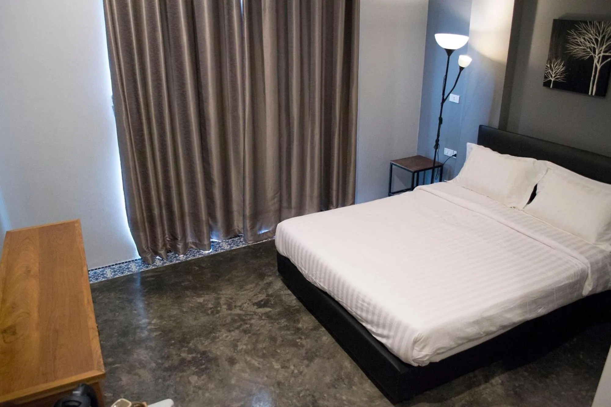 Bed in Nornlamphun Boutique Hotel