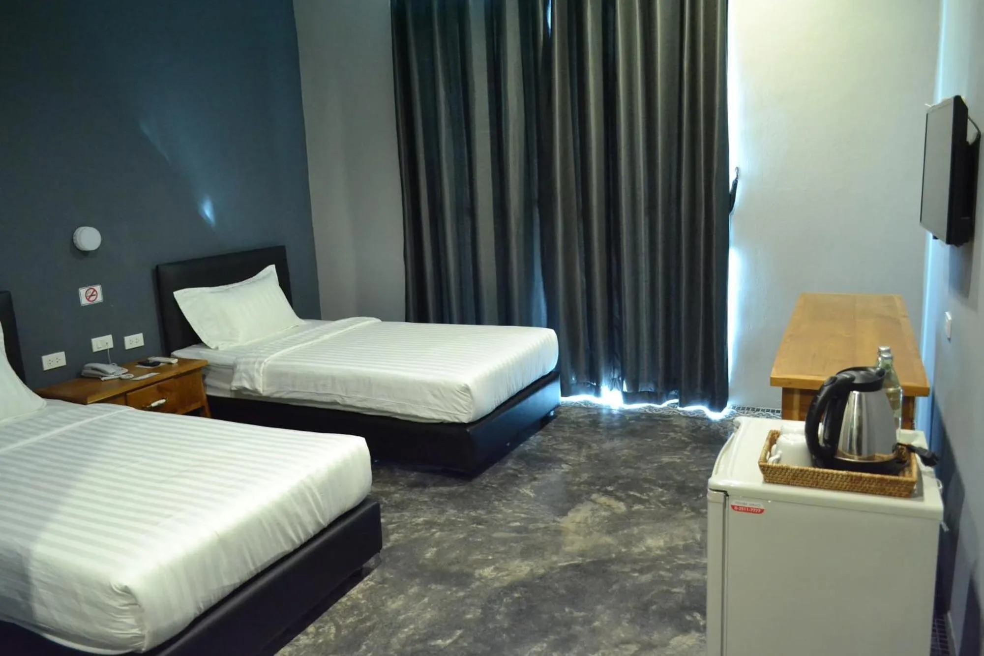 Bed in Nornlamphun Boutique Hotel