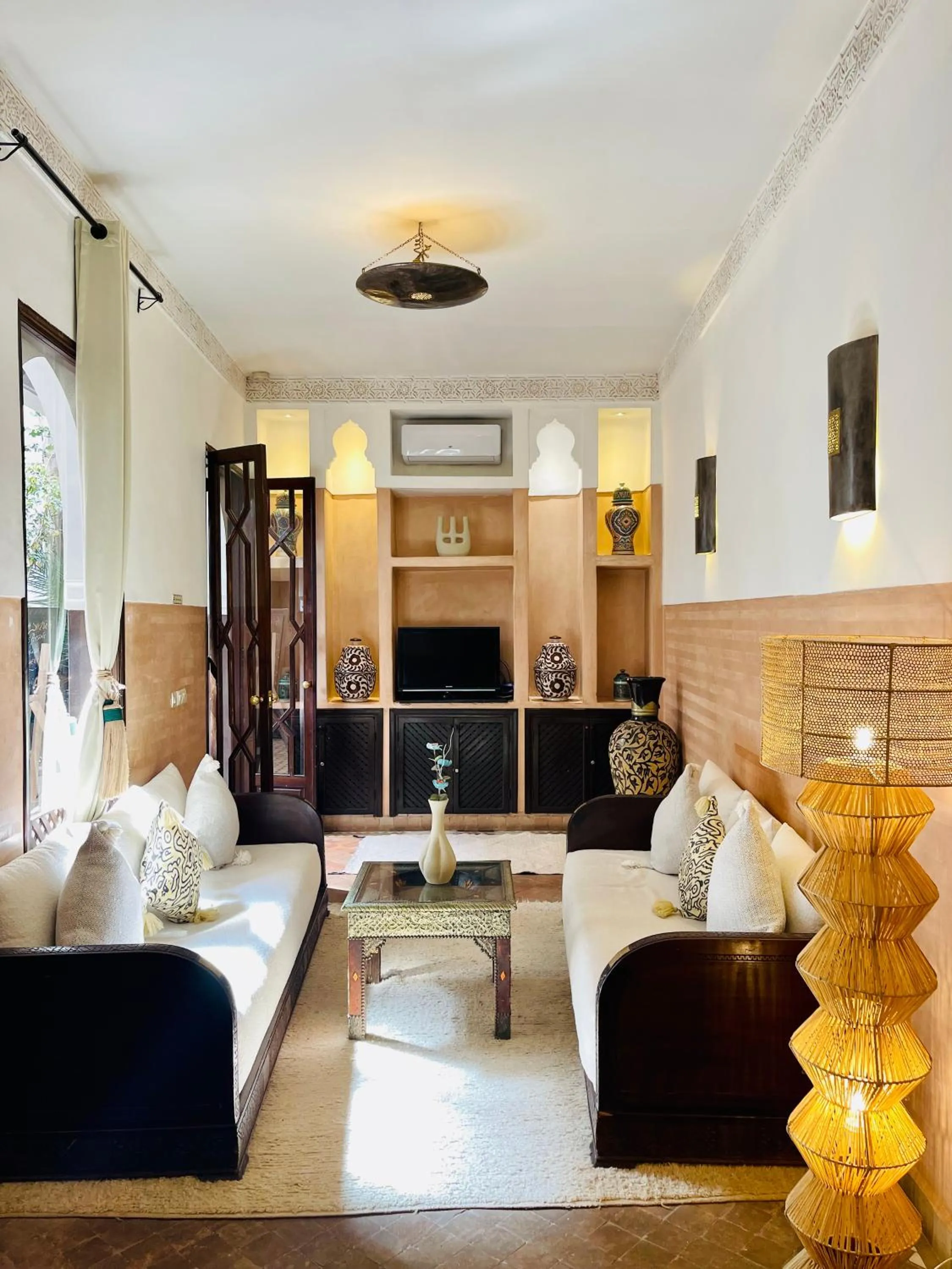 Living room in Riad La Porte Rouge By La Siredrah