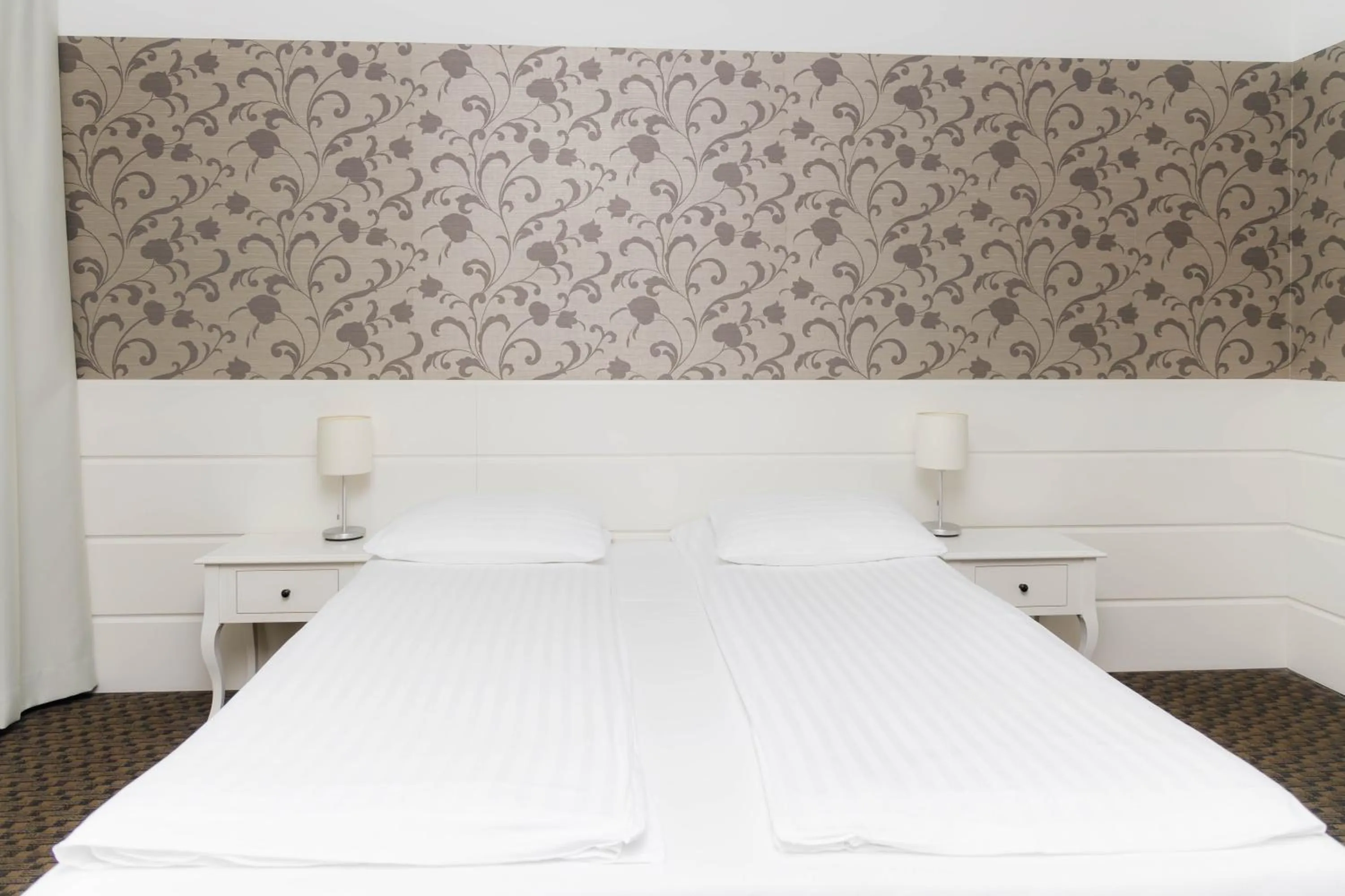 Bed in Hotel Lamberton