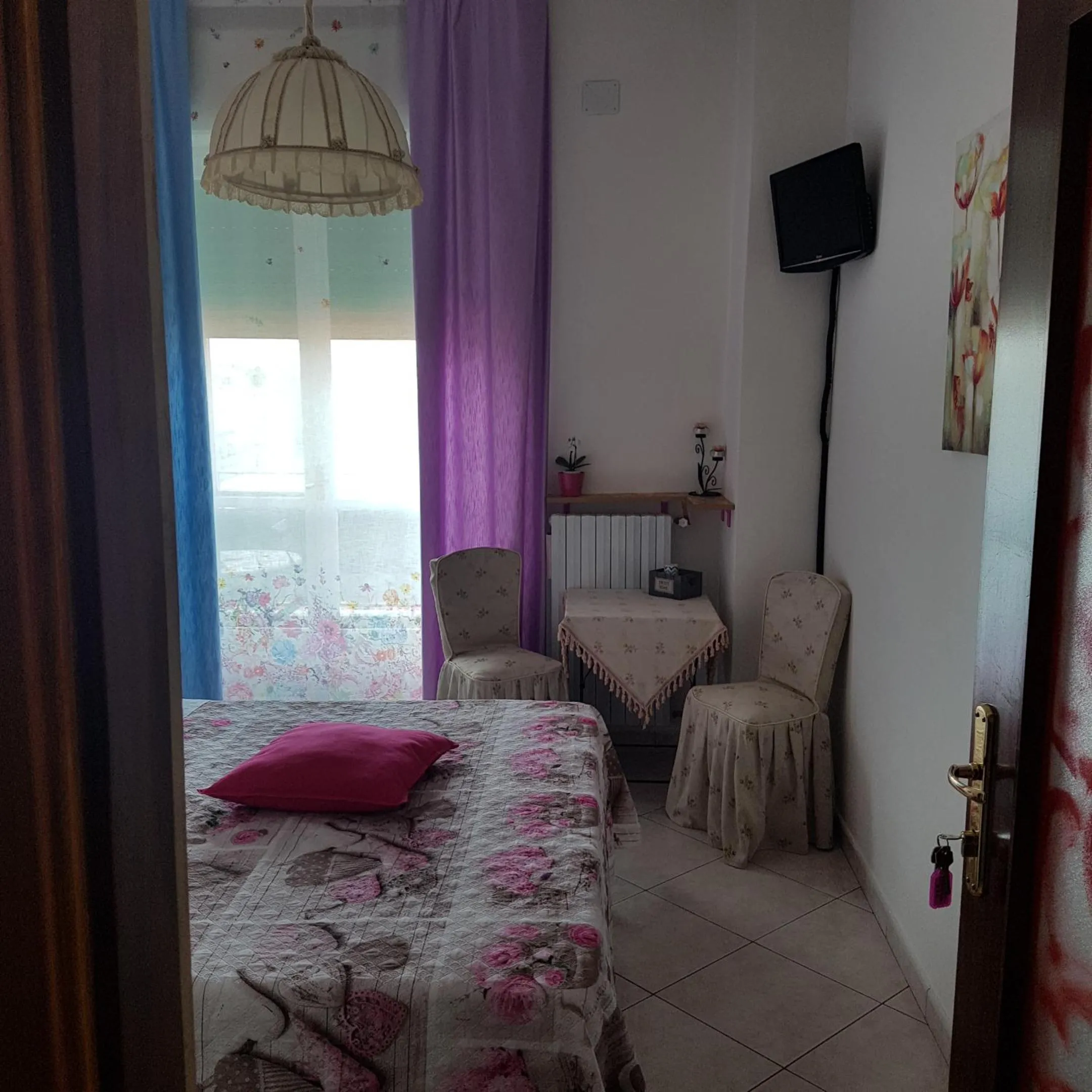 Photo of the whole room in B & B Arco di Sole