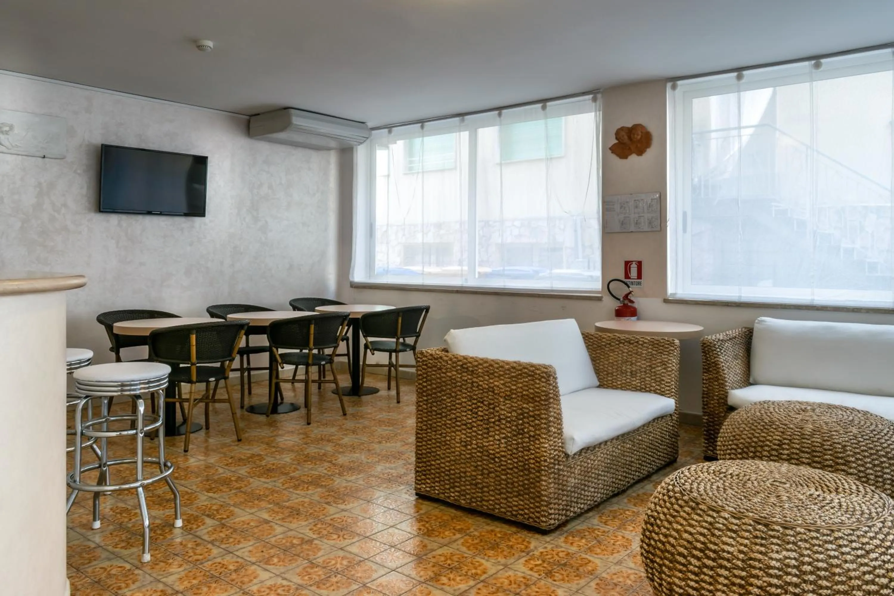 Communal lounge/ TV room in Hotel Stresa