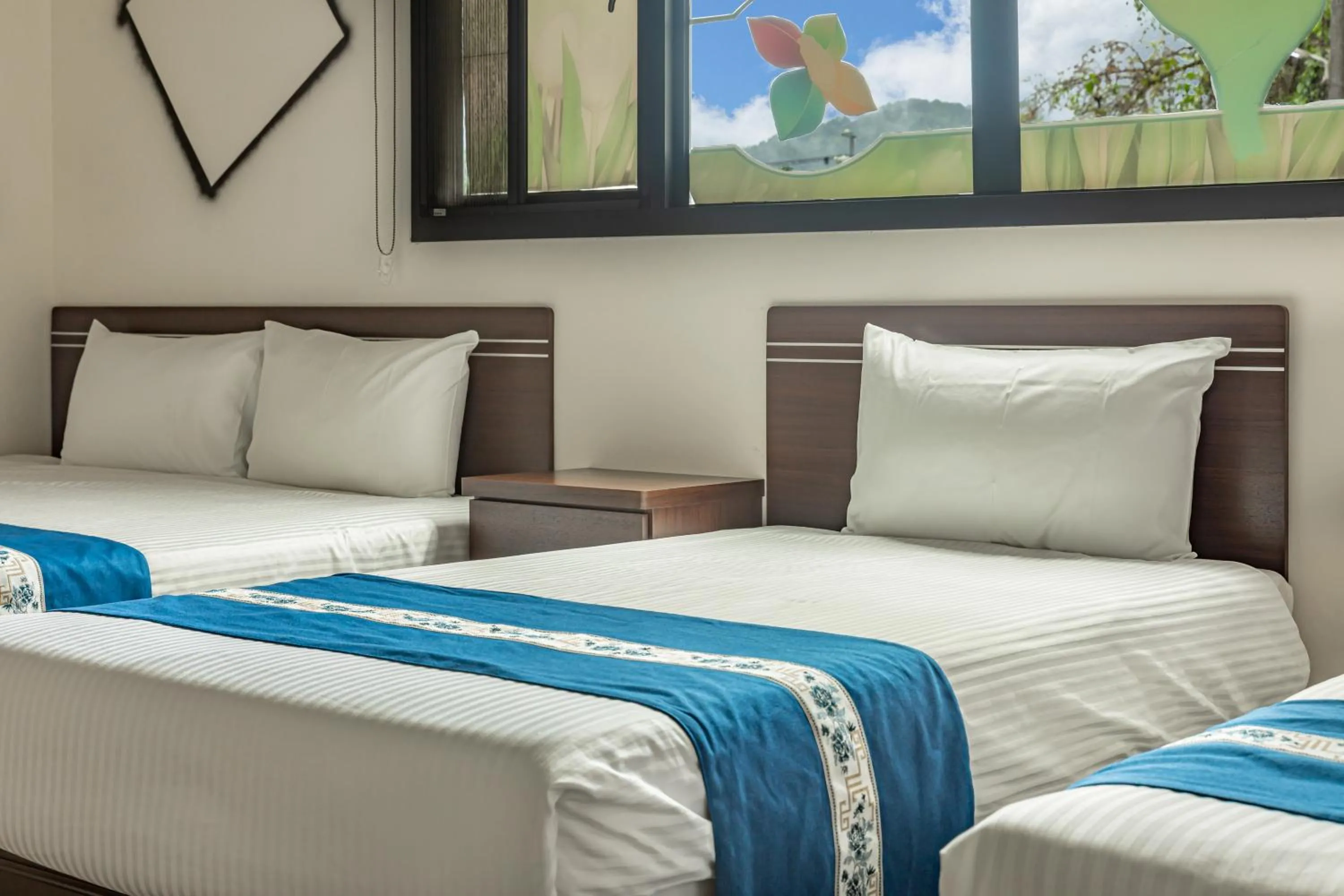 Bed in Sun Moon Lake Jinlongshan BnB