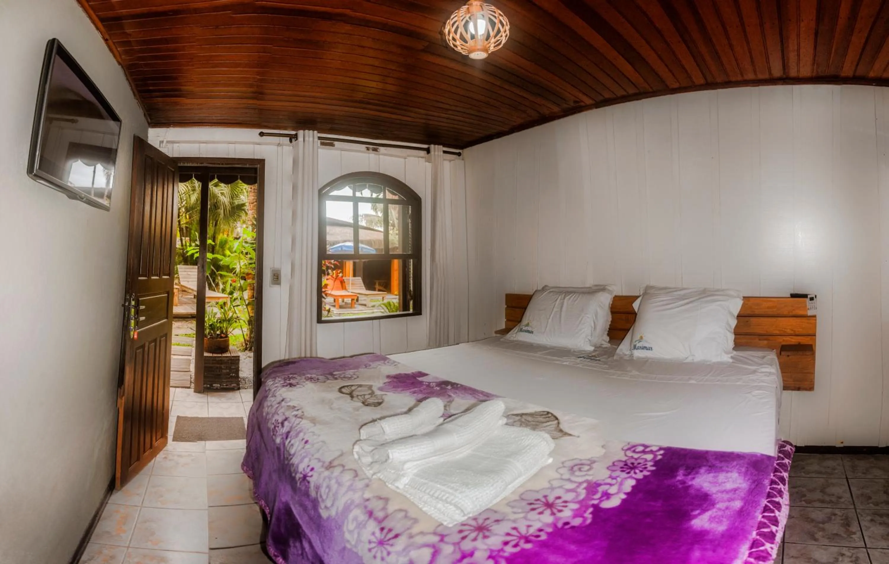 Garden view, Bed in Pousada Marimar