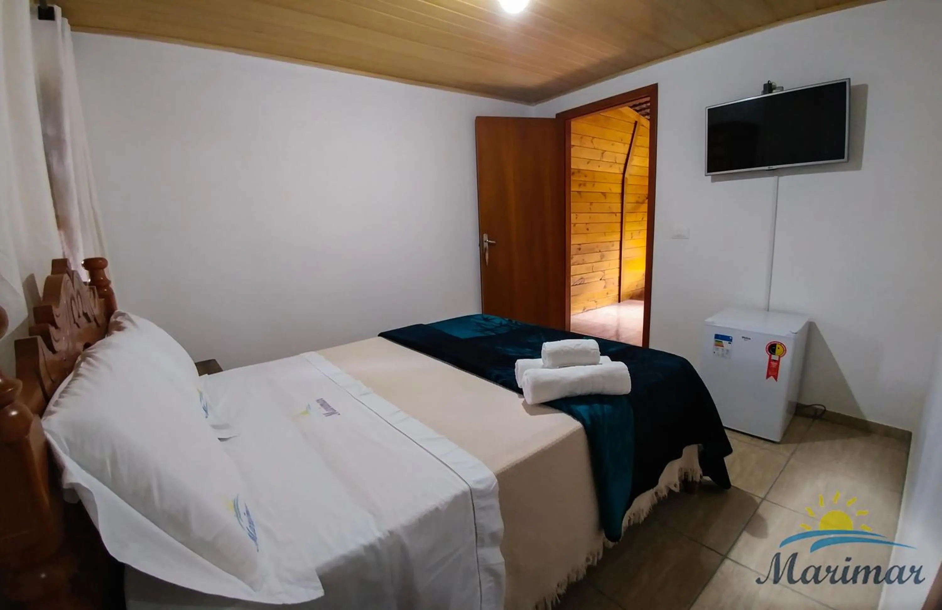 Bed in Pousada Marimar