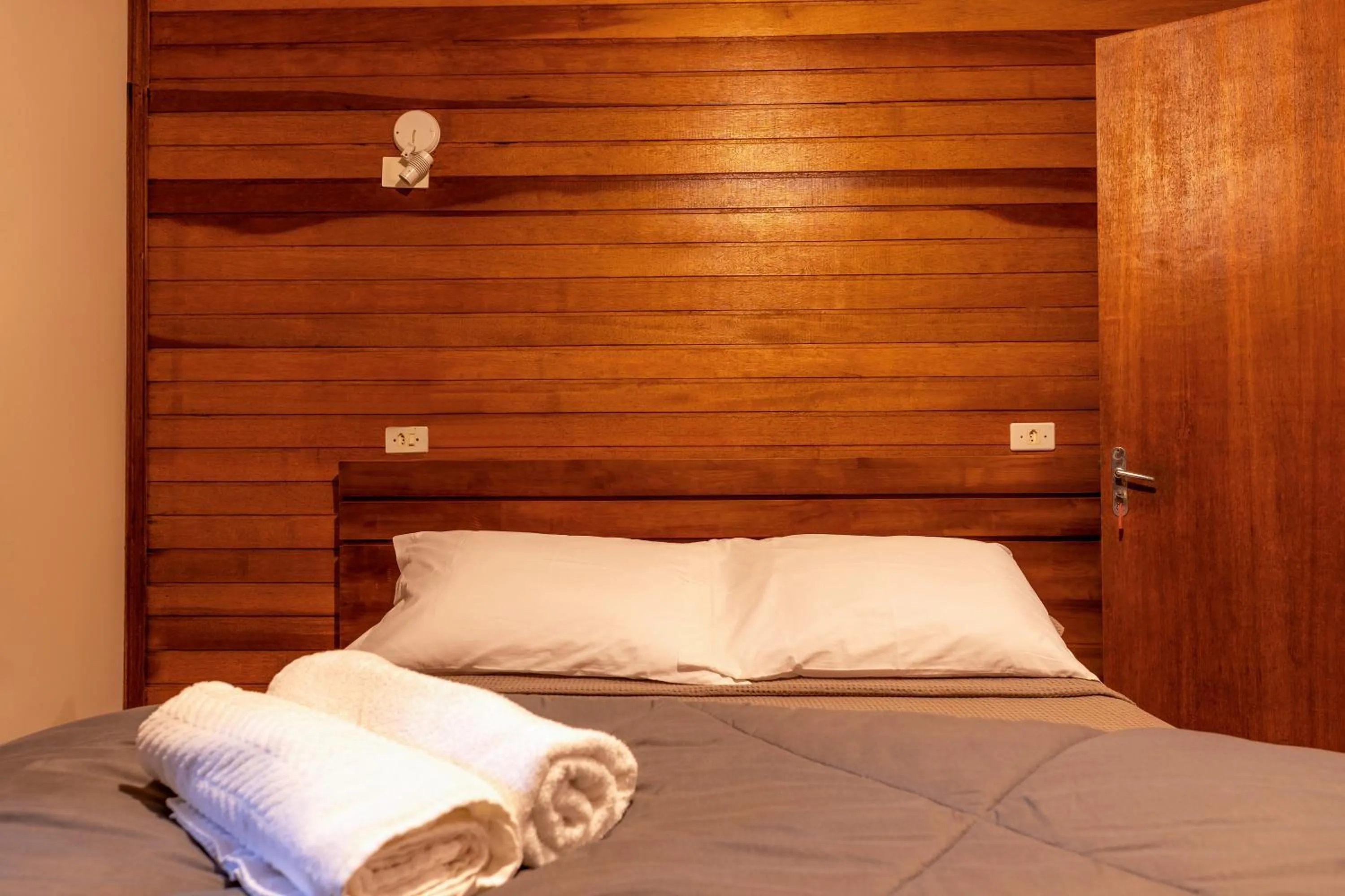 Bed in Pousada Marimar