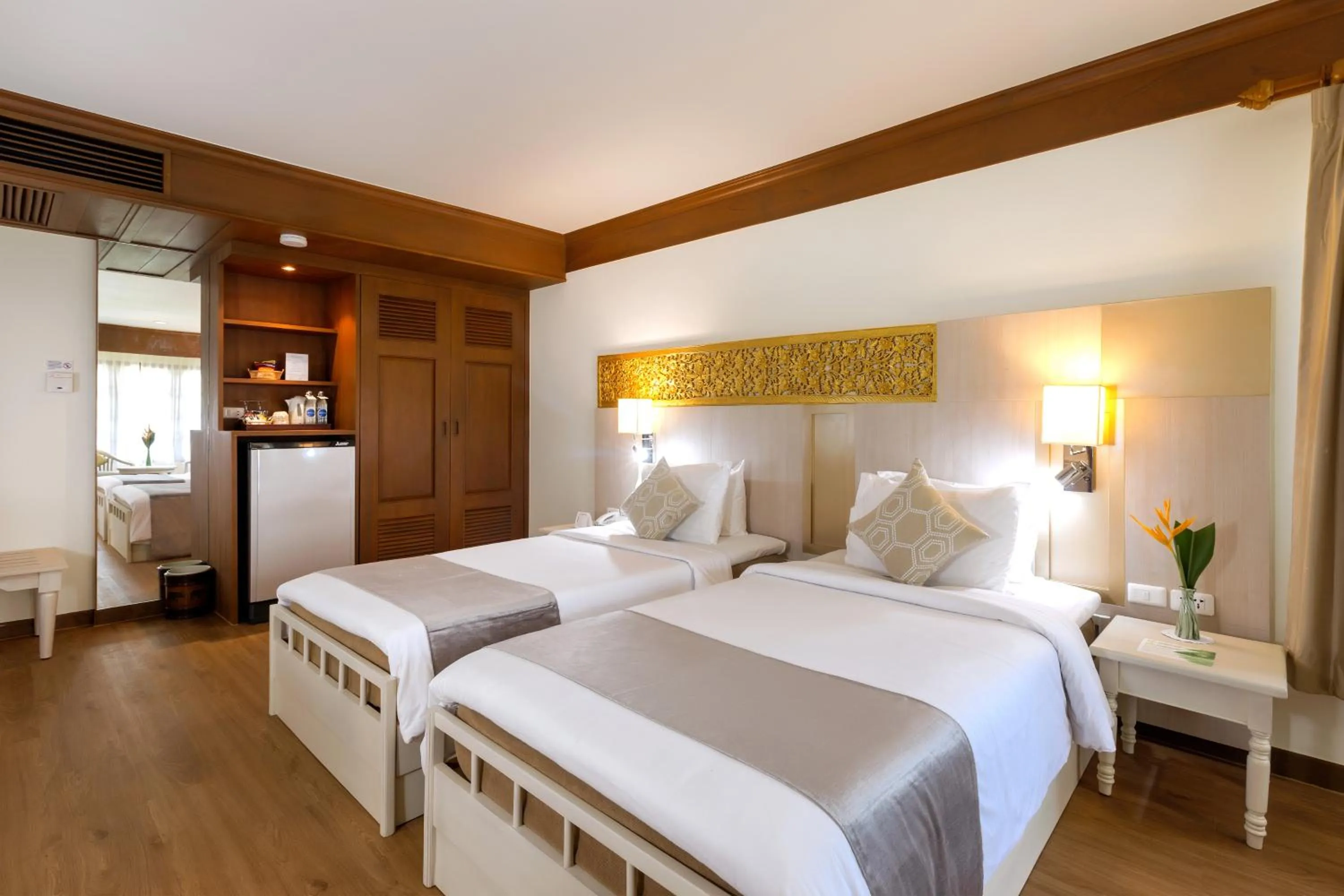 Bed in Best Western Premier Bangtao Beach Resort & Spa