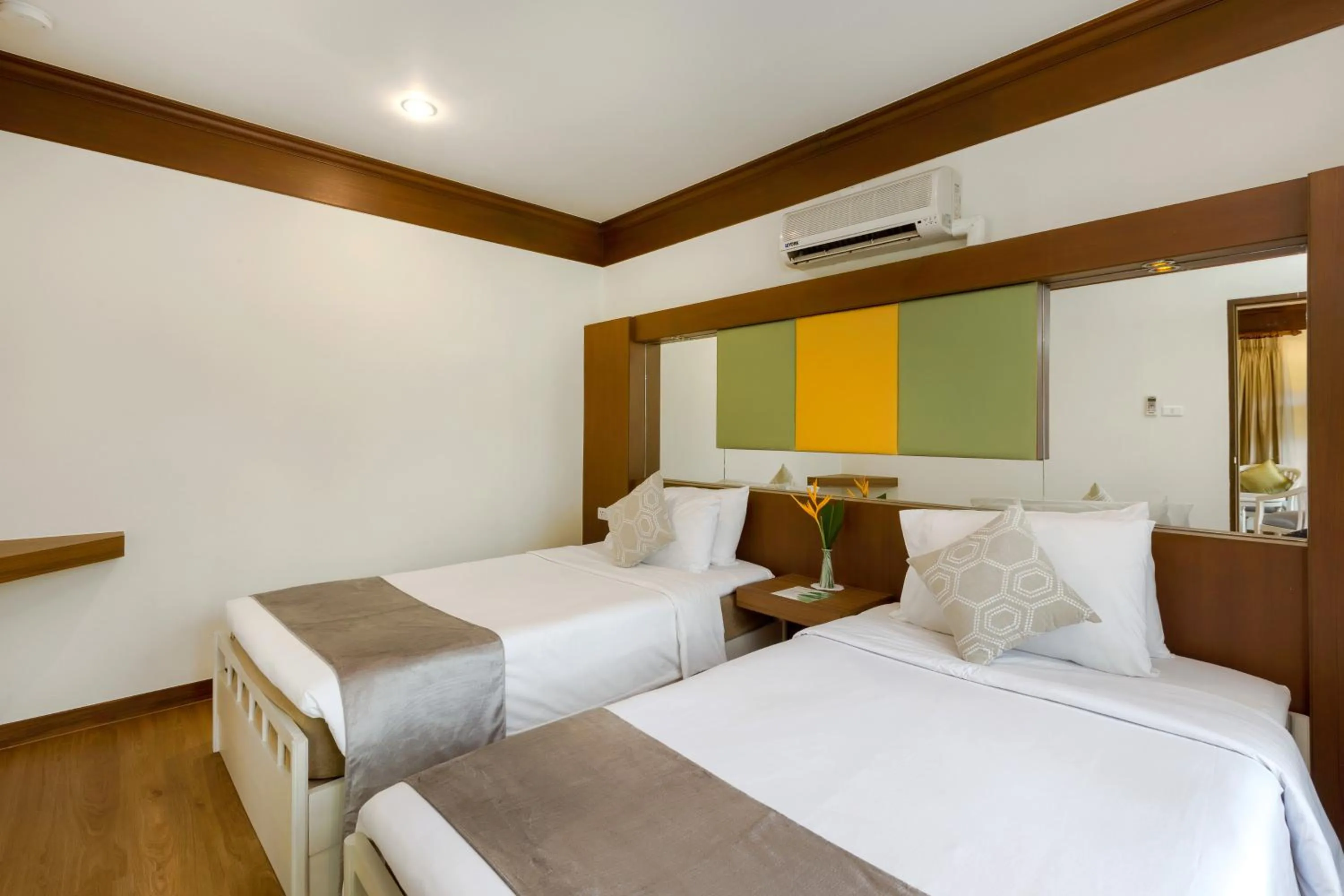 Bed in Best Western Premier Bangtao Beach Resort & Spa