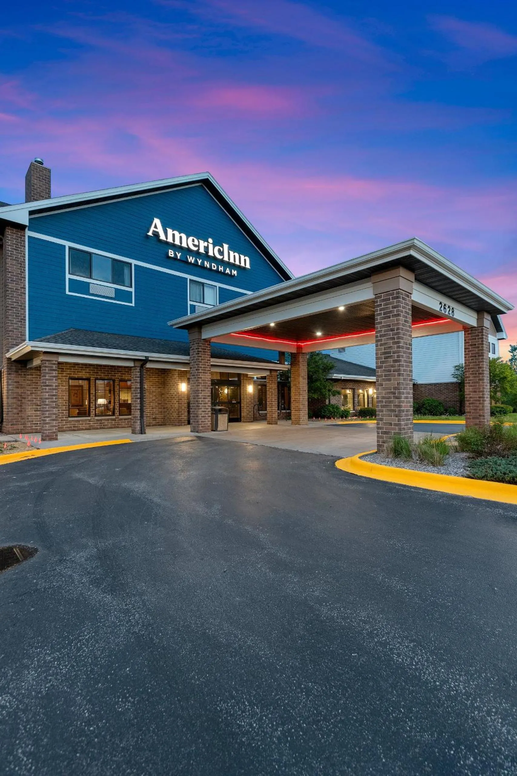 Property building in AmericInn by Wyndham Green Bay East