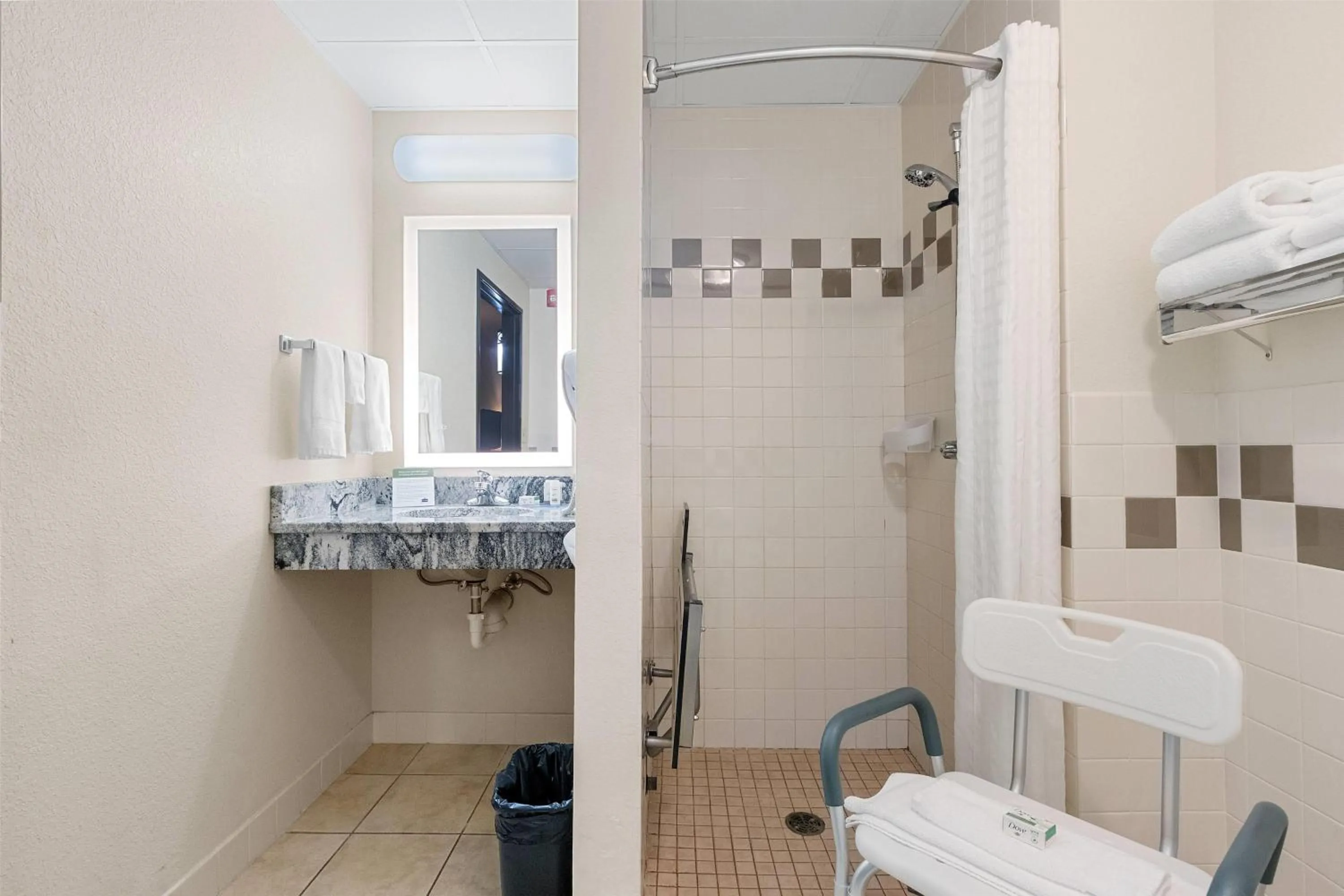 Shower in AmericInn by Wyndham Green Bay East