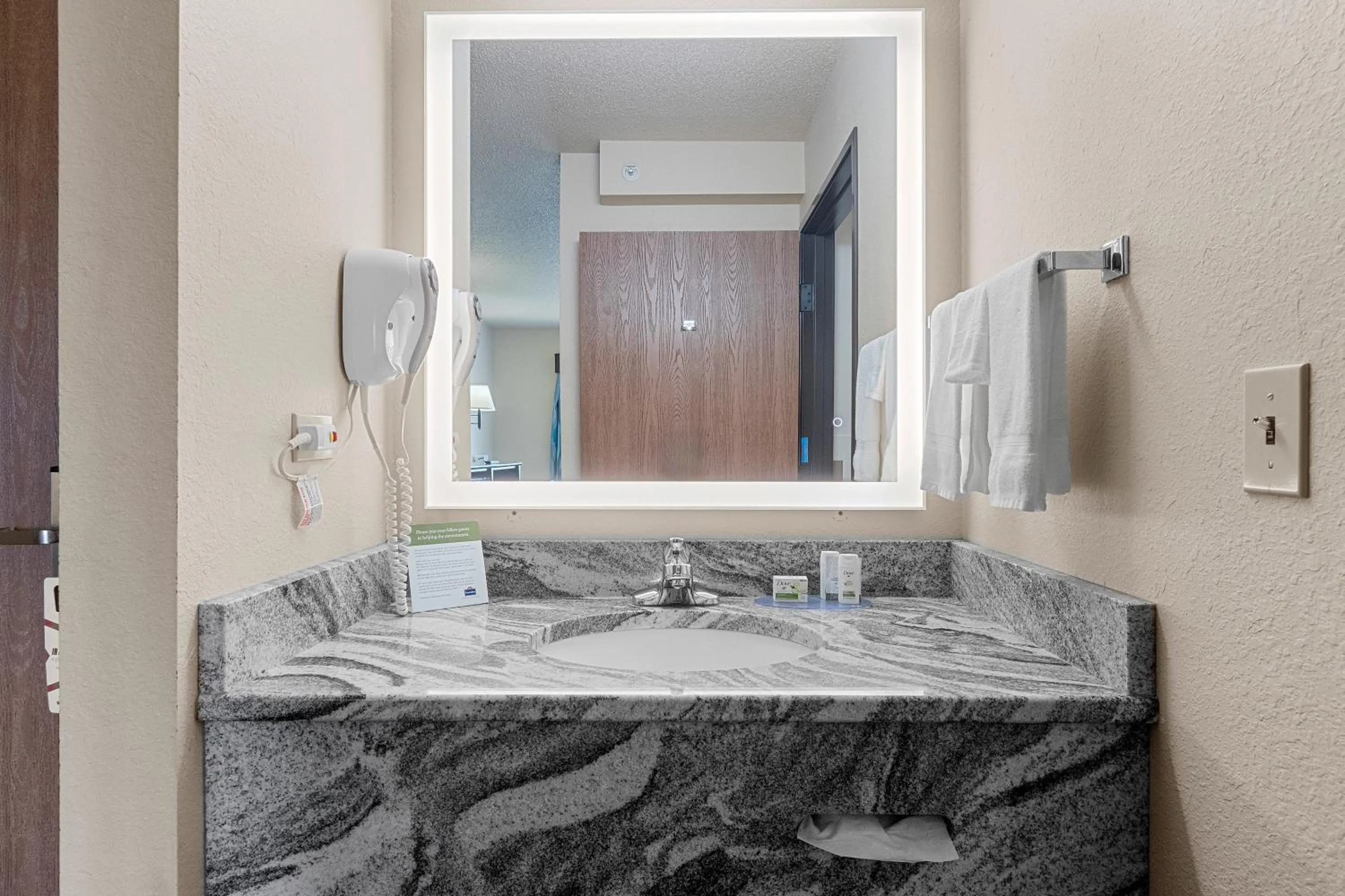 Bathroom in AmericInn by Wyndham Green Bay East