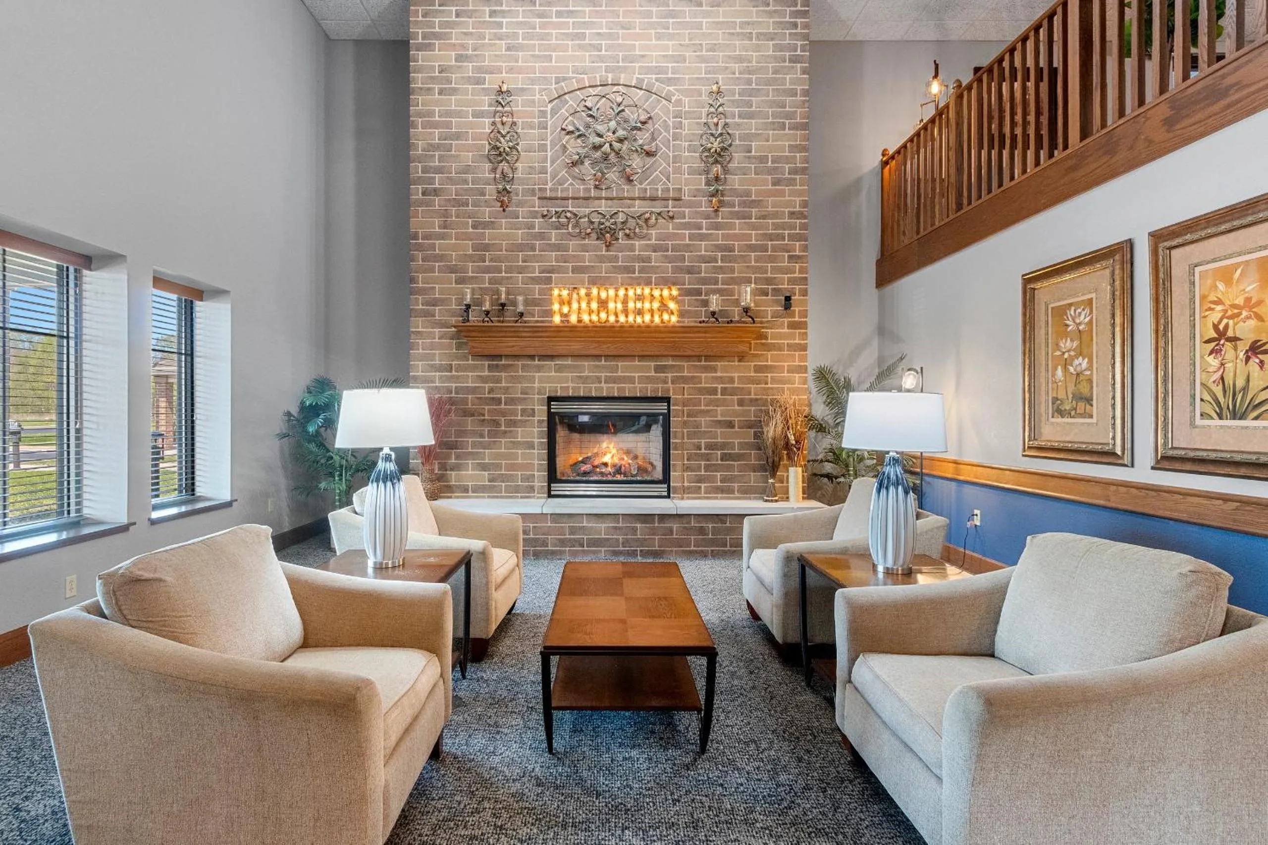 Lobby or reception in AmericInn by Wyndham Green Bay East