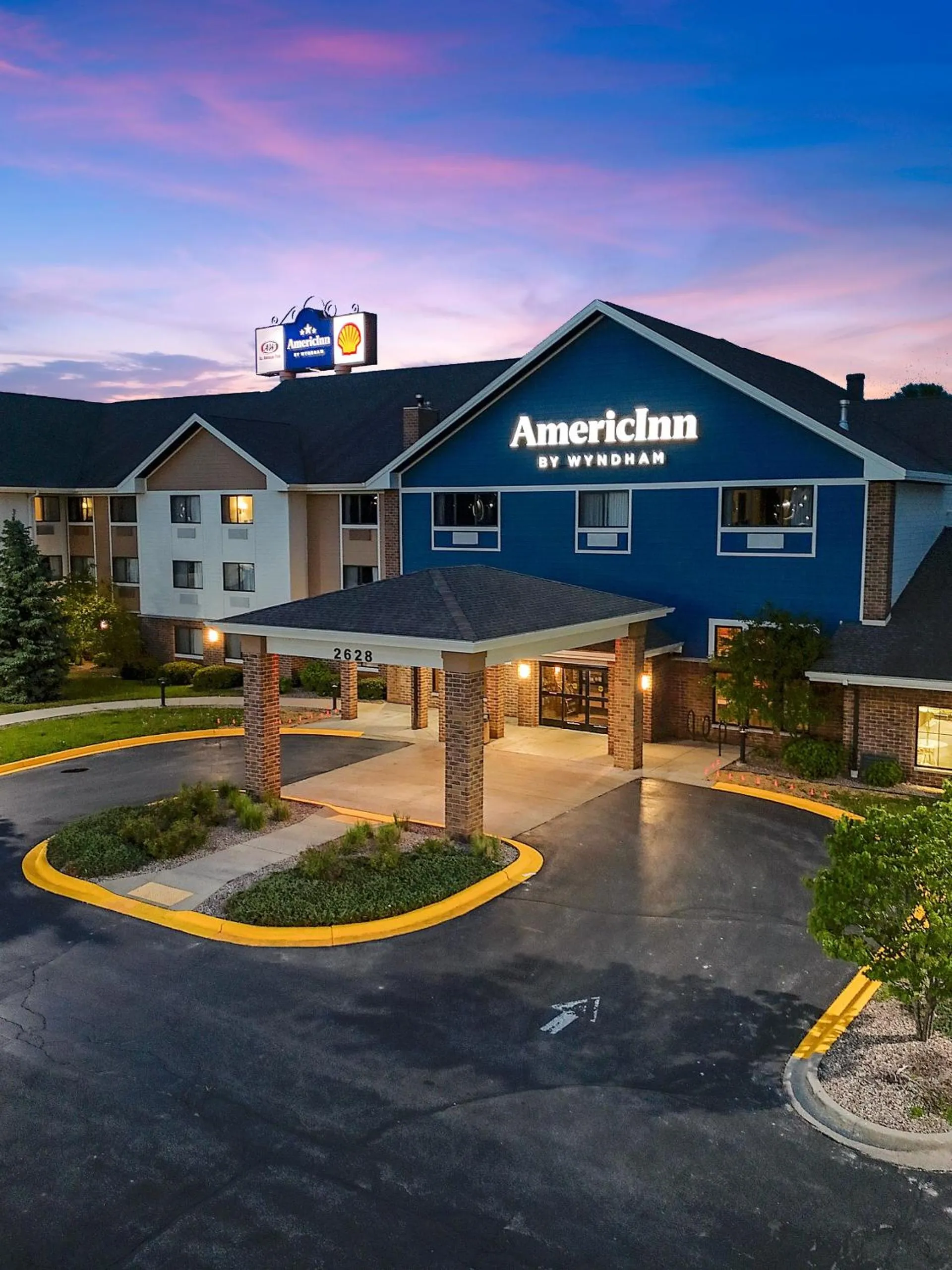 Property building in AmericInn by Wyndham Green Bay East