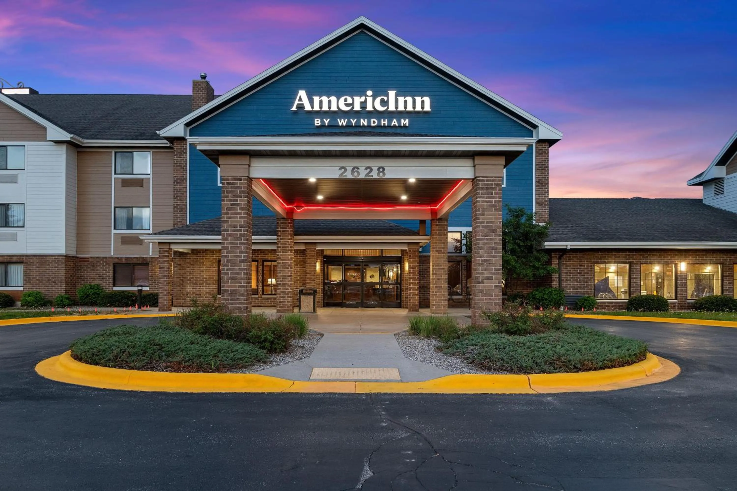 Property building in AmericInn by Wyndham Green Bay East