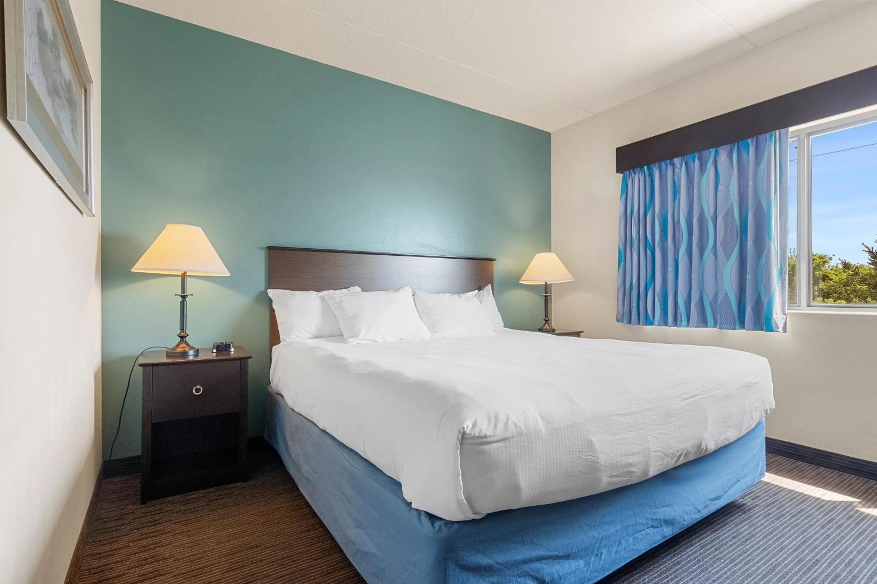 Bed in AmericInn by Wyndham Green Bay East