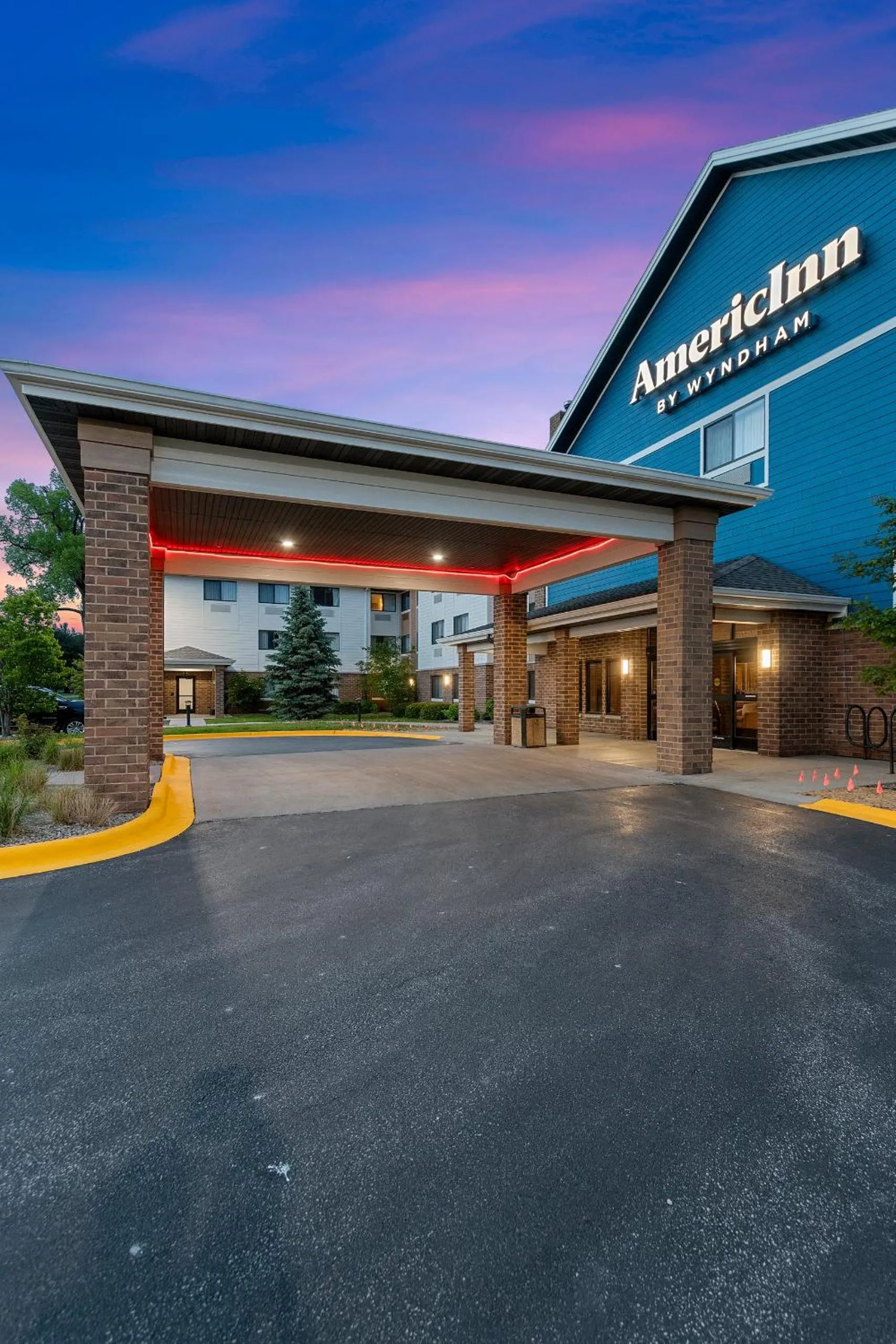 Property building in AmericInn by Wyndham Green Bay East