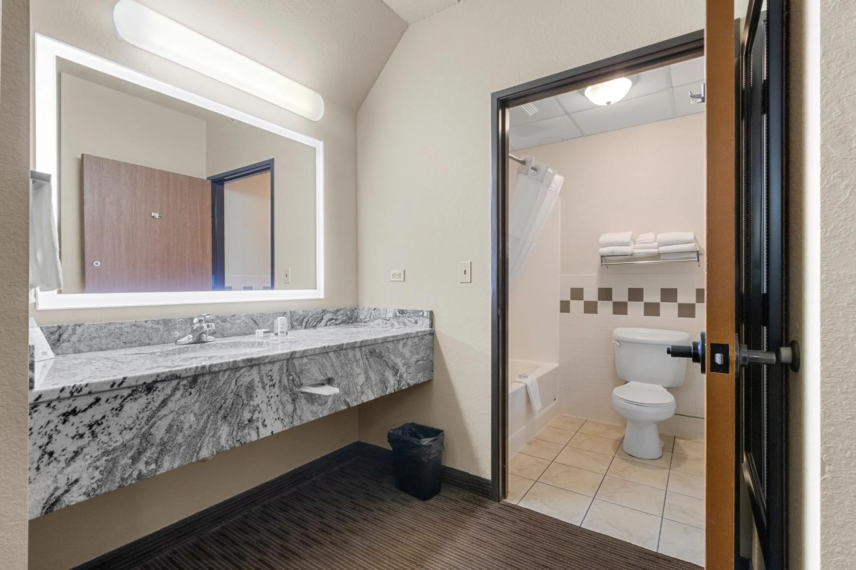 Bathroom in AmericInn by Wyndham Green Bay East