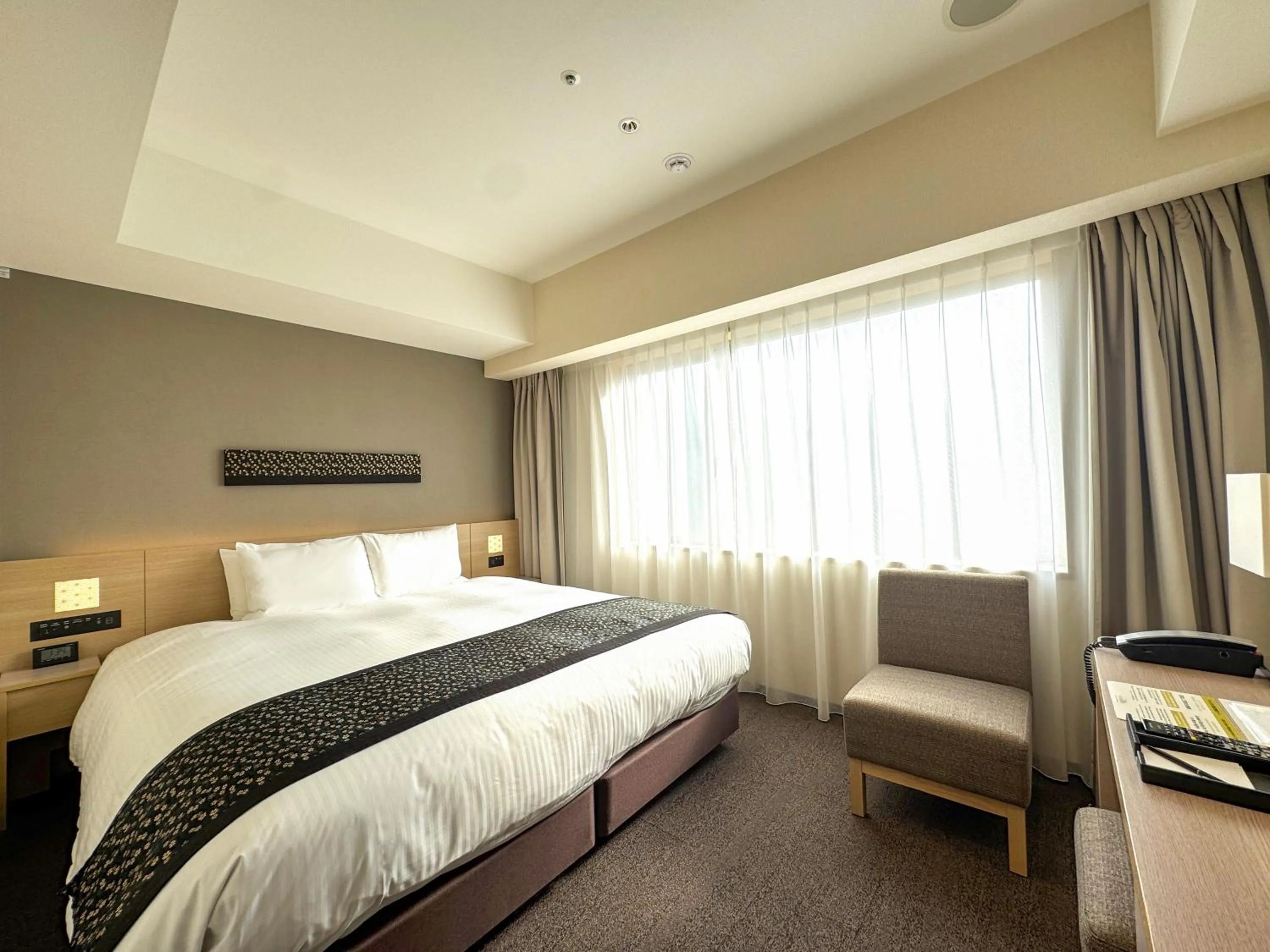 Bed in Hotel Intergate Kyoto Shijo Shinmachi