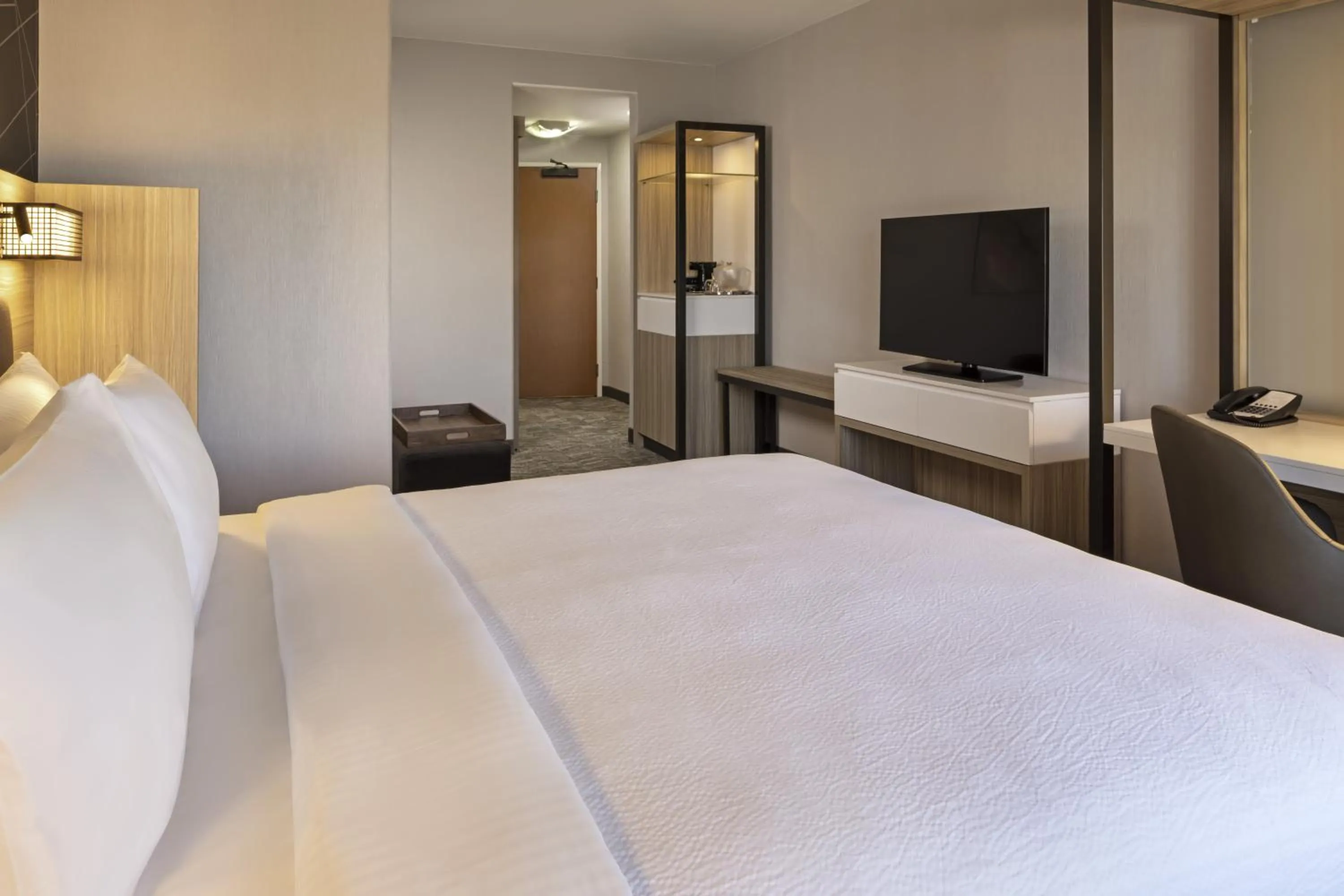 Photo of the whole room, Bed in Comfort Suites