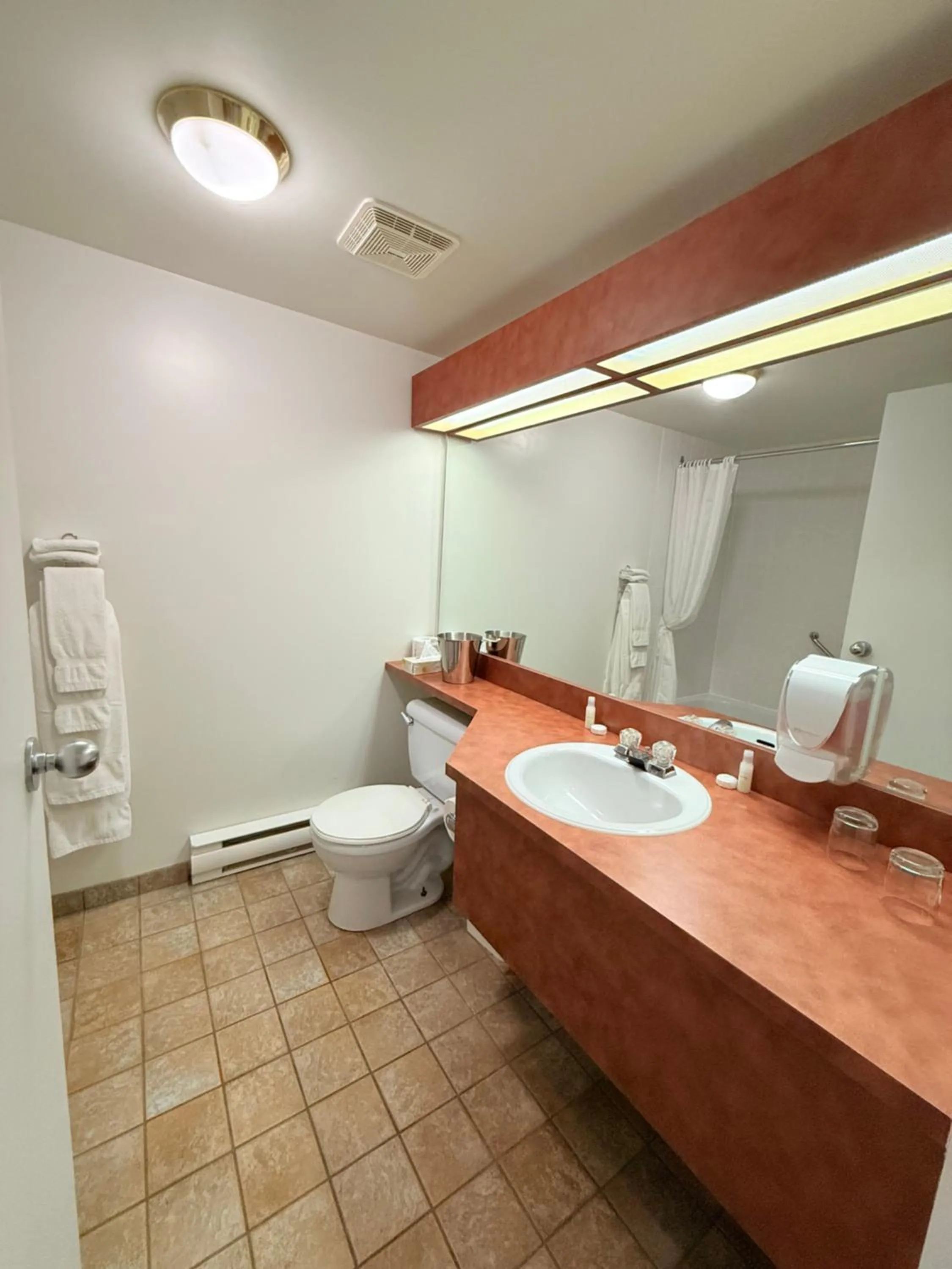 Bathroom in Hôtel au Petit Berger