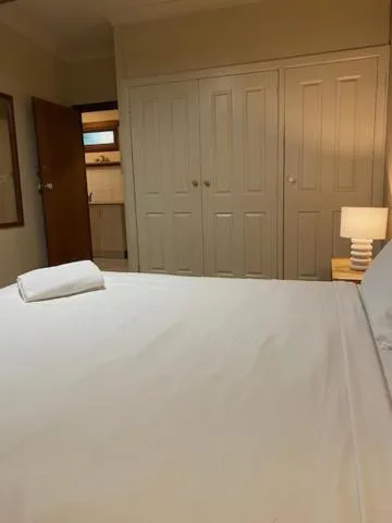 Bed in Tallow Beach Motel