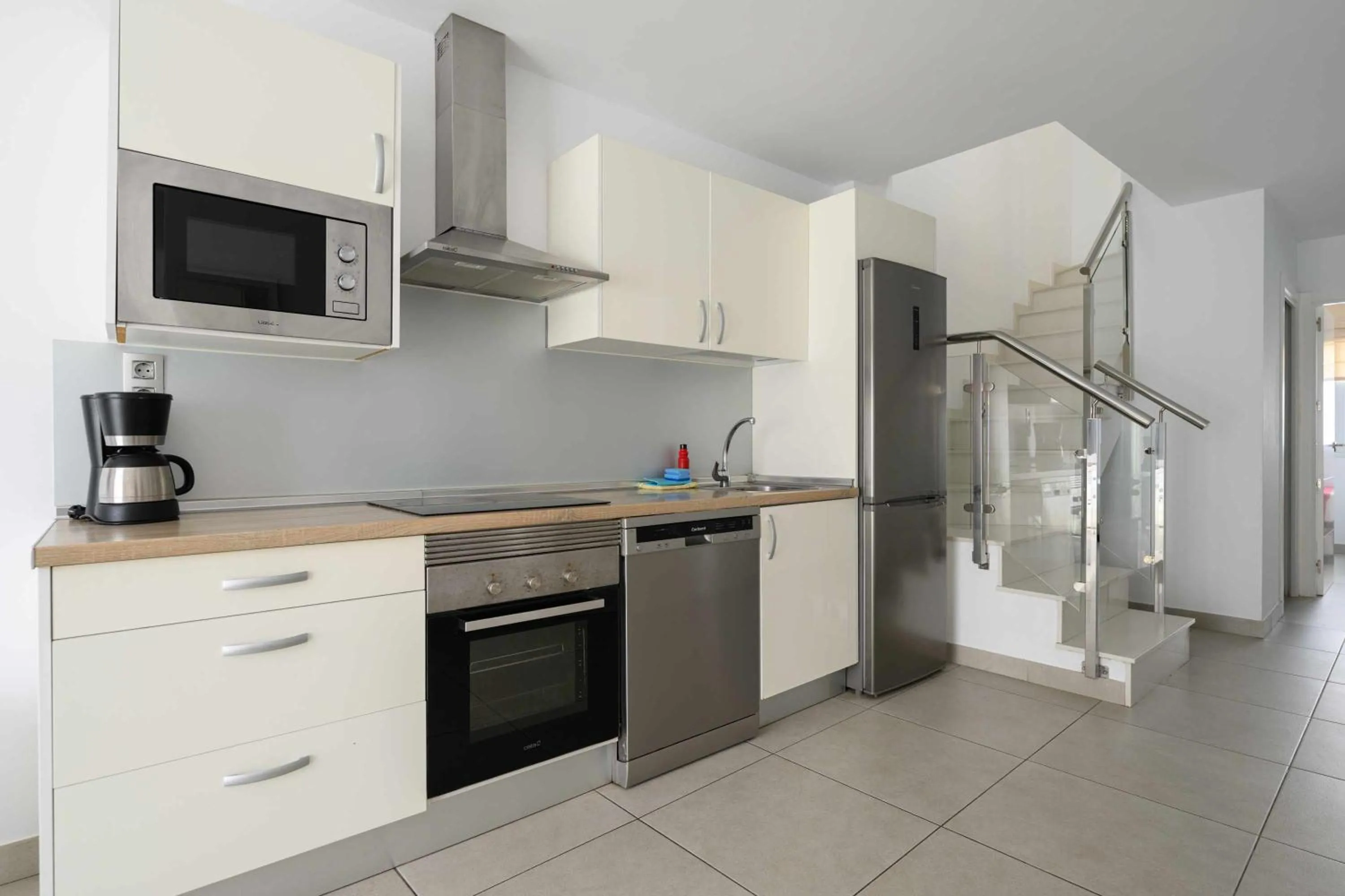Kitchen or kitchenette in Canteras Suites