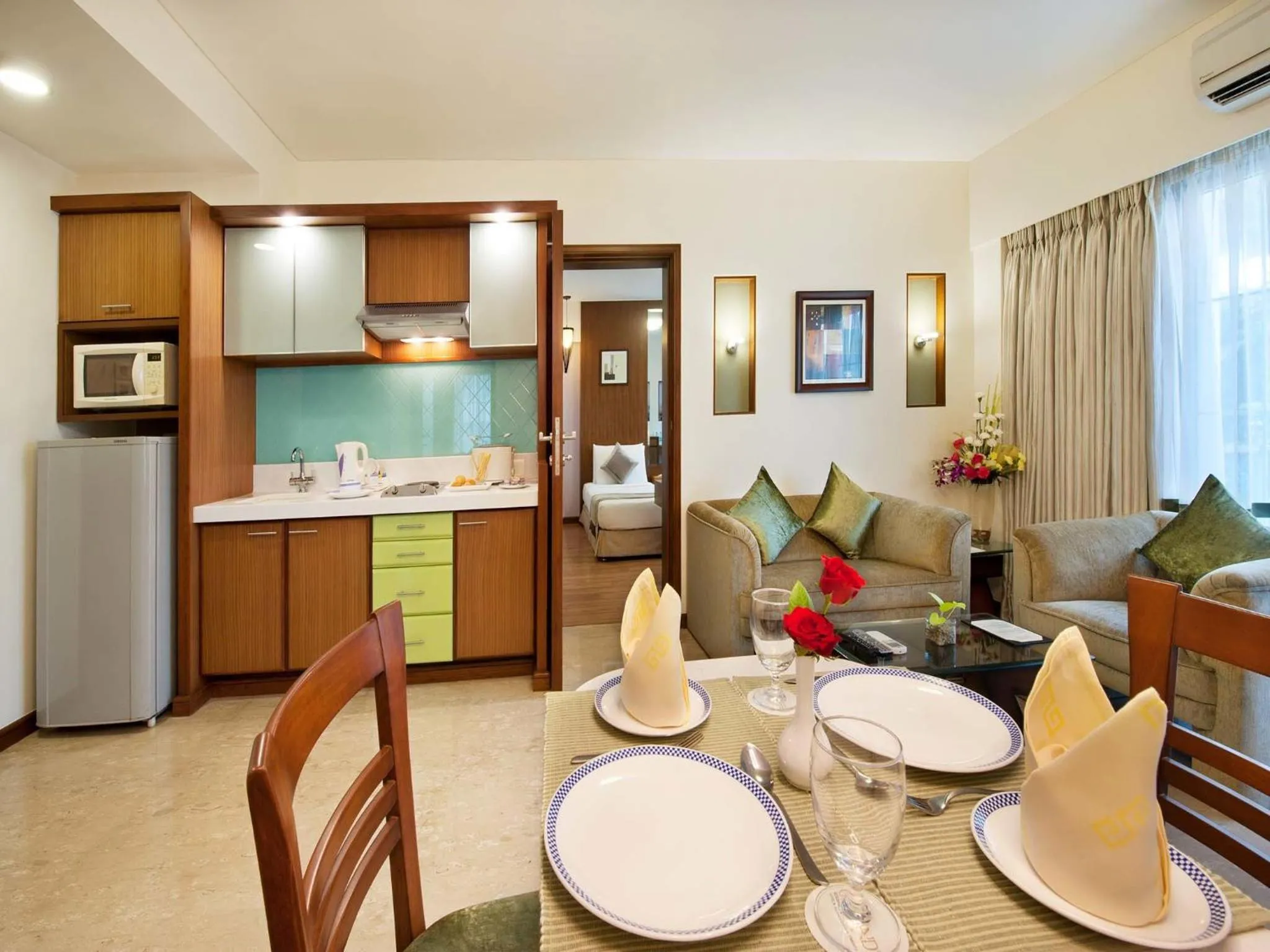 Kitchen or kitchenette in Grand Residency Hotel & Serviced Apartments