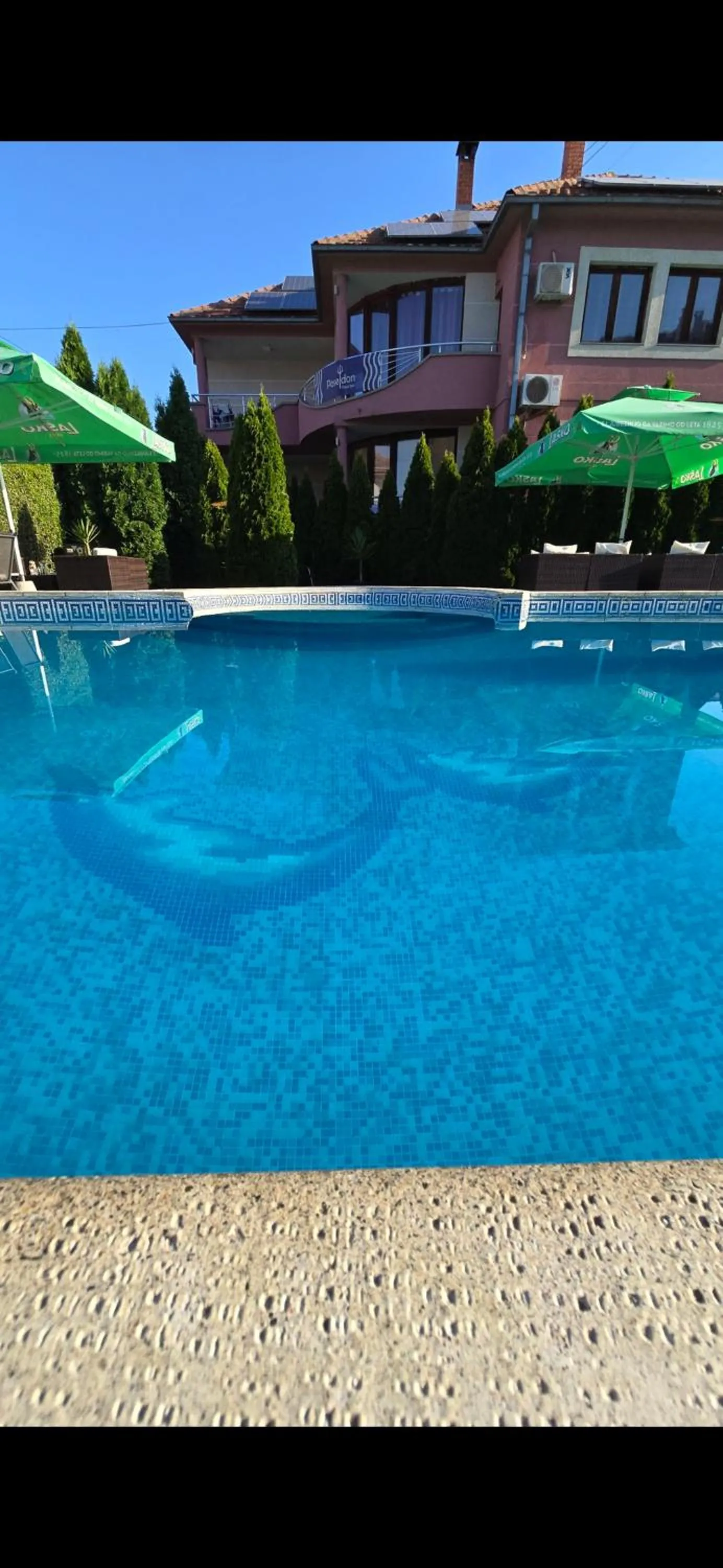 Swimming pool in Poseidon Apartment