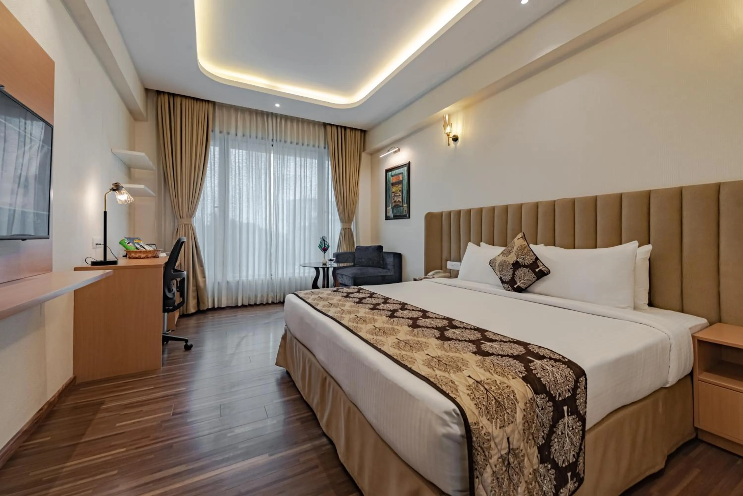 Bed in Goldfinch Hotel Mangalore