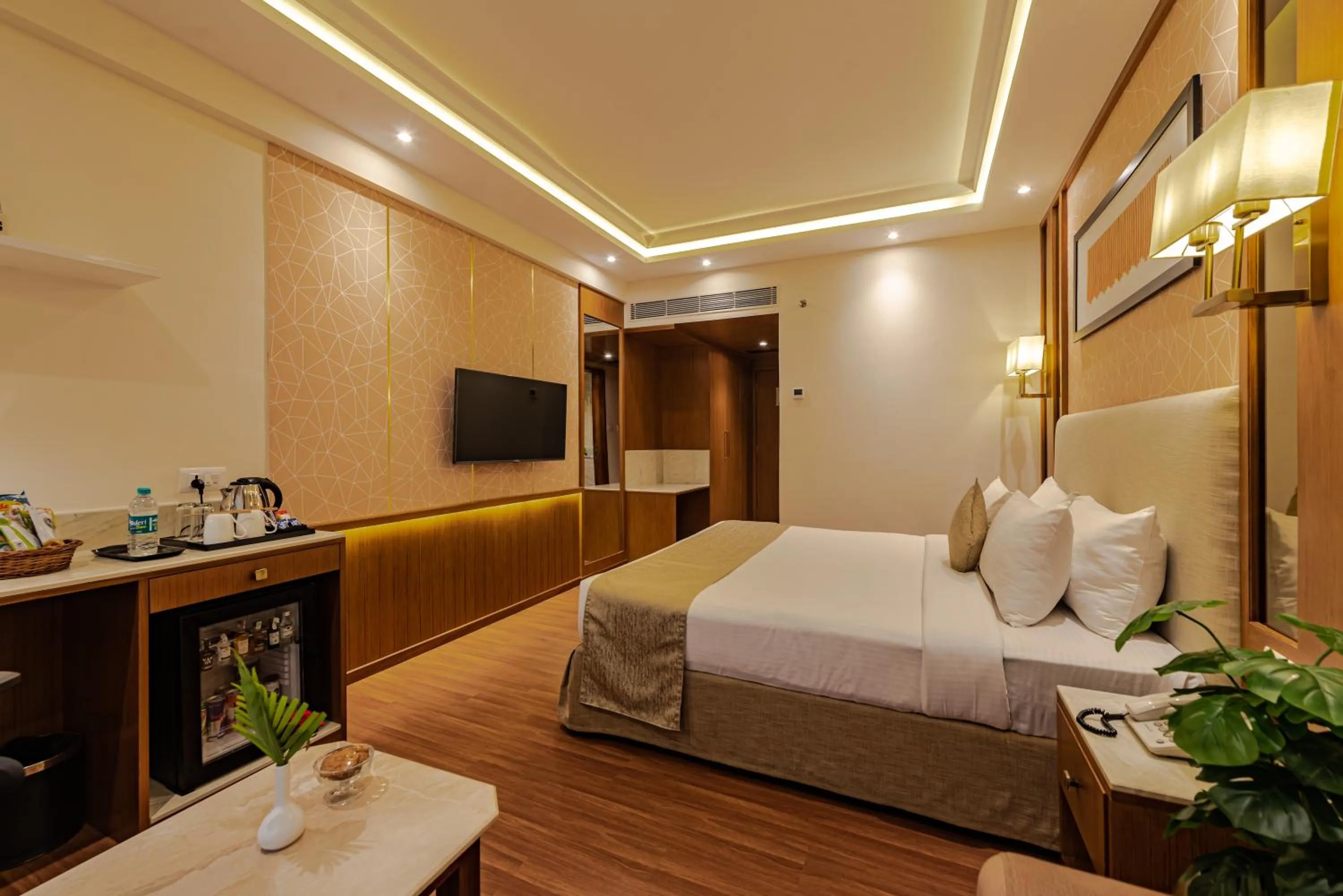 Bed in Goldfinch Hotel Mangalore