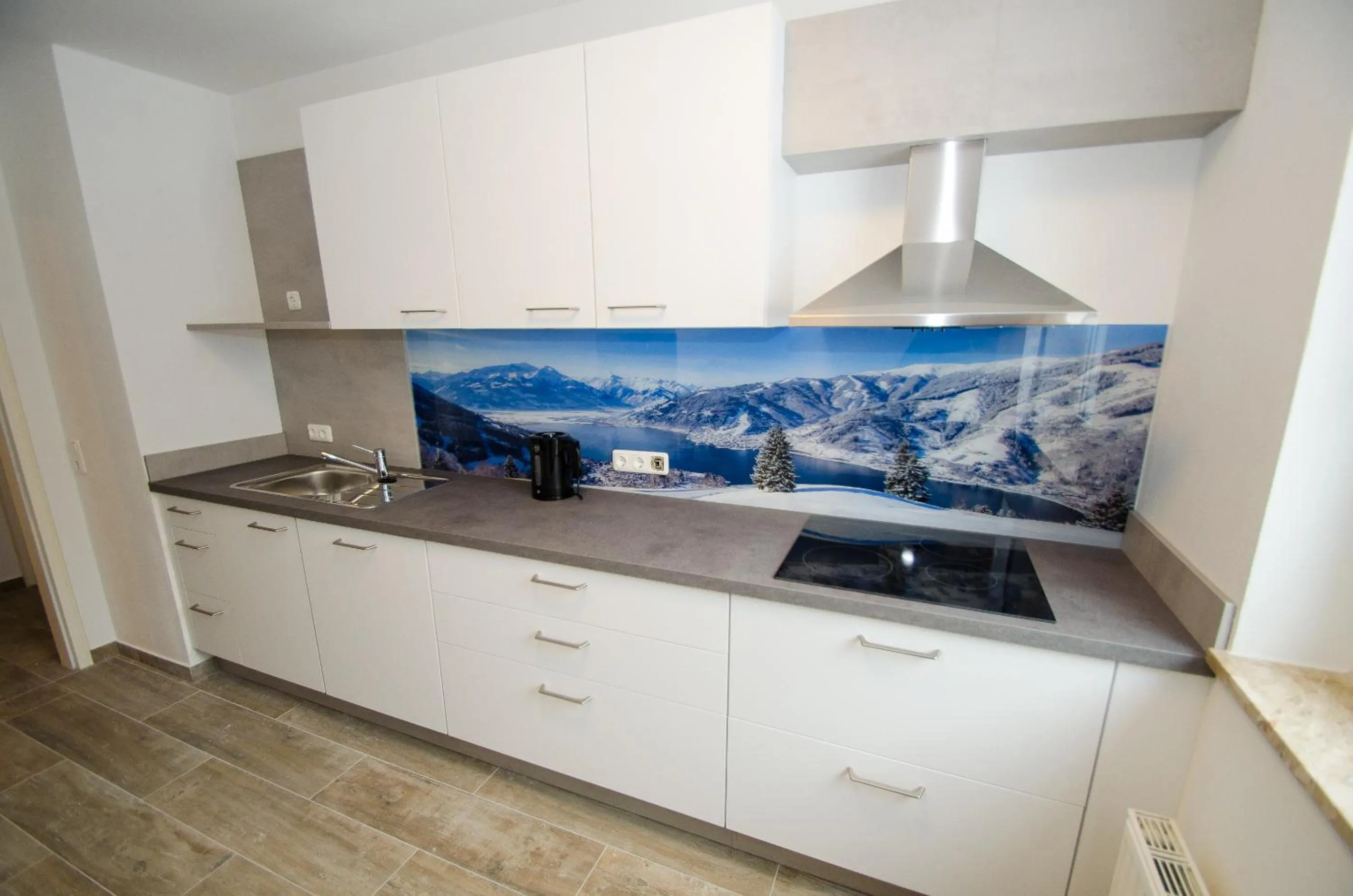 Kitchen or kitchenette in Apartments Summer & Winter Fun by All in One Apartments incl SUMMER CARD
