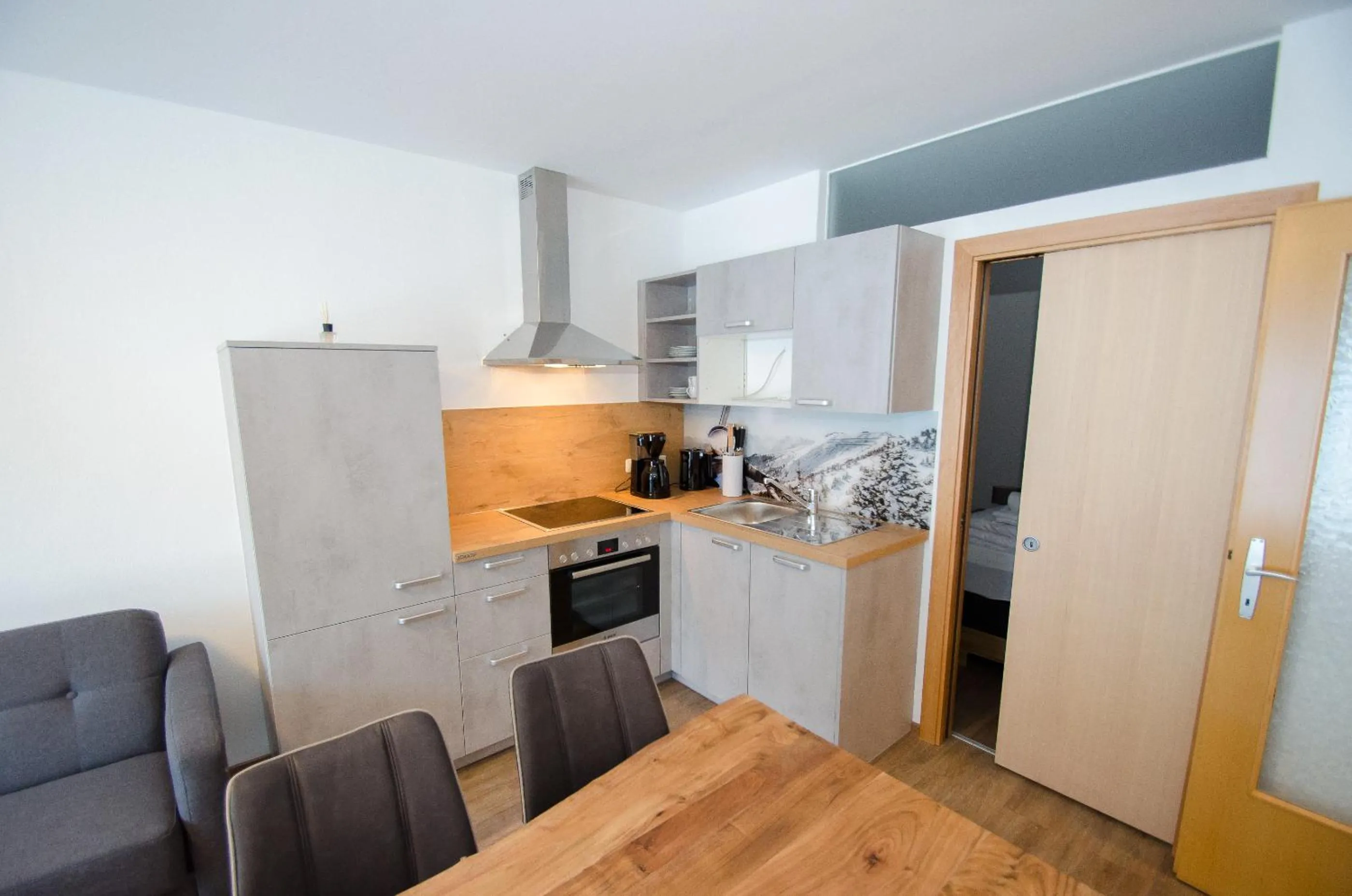 Kitchen or kitchenette in Apartments Summer & Winter Fun by All in One Apartments incl SUMMER CARD