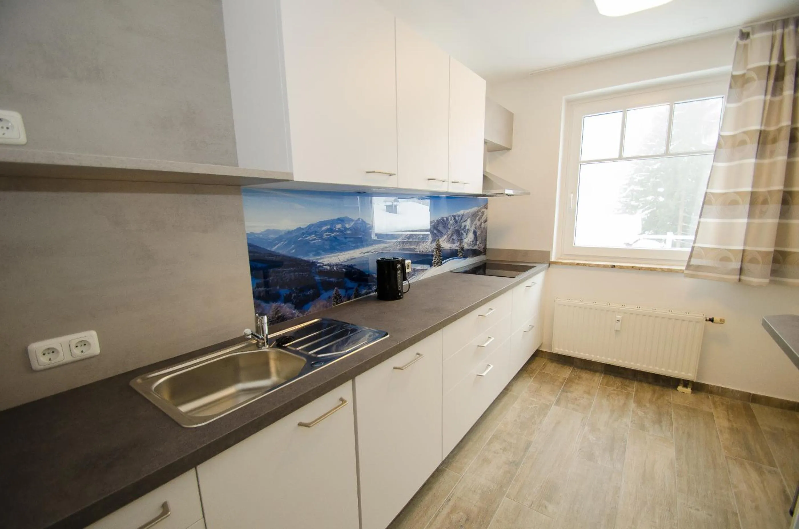 Kitchen or kitchenette in Apartments Summer & Winter Fun by All in One Apartments incl SUMMER CARD