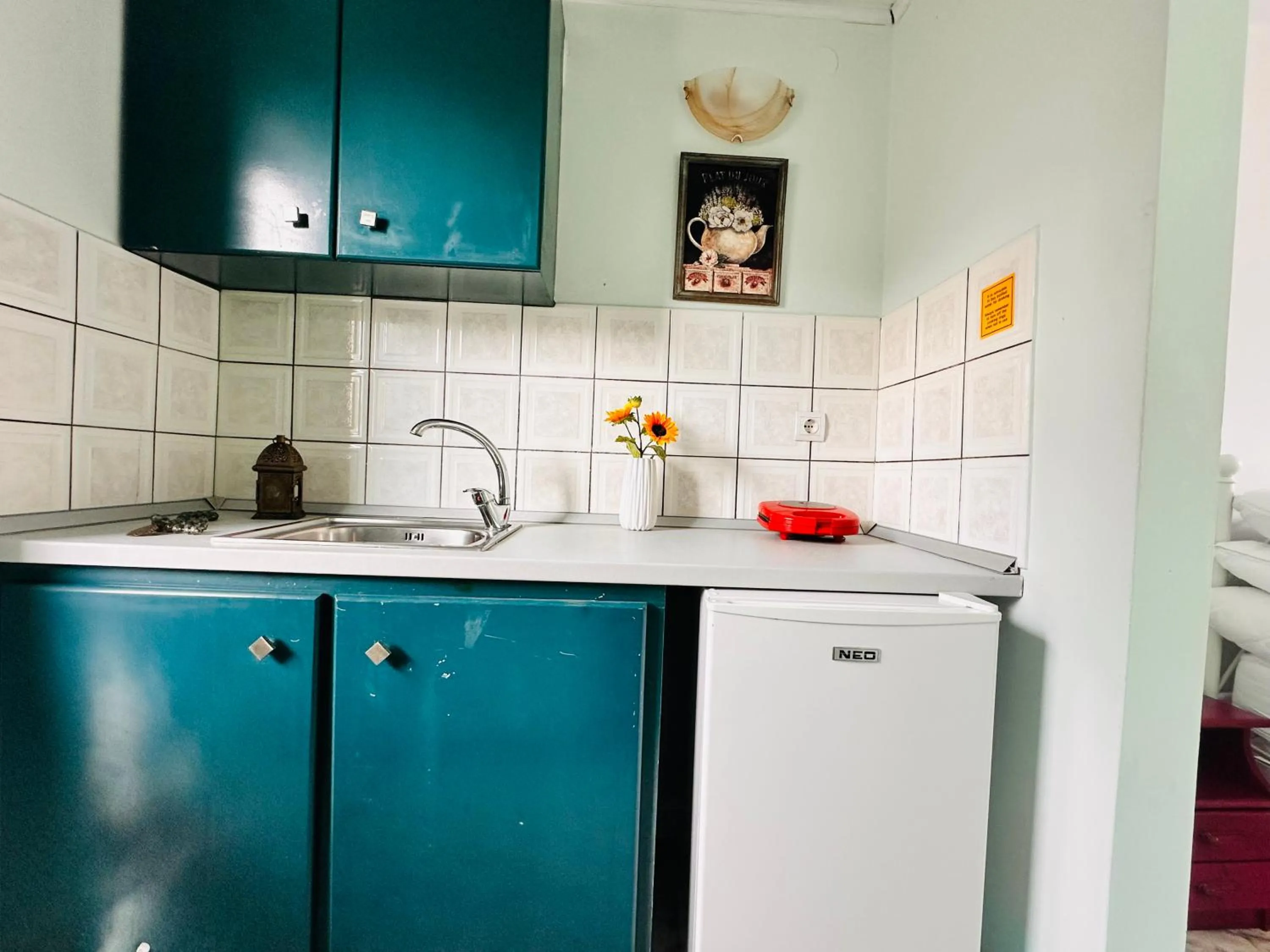 Kitchen or kitchenette in Infinity blue beach apartments - Renovated Apartments 2 Minutes from the Sea & Pool with Scenic Views