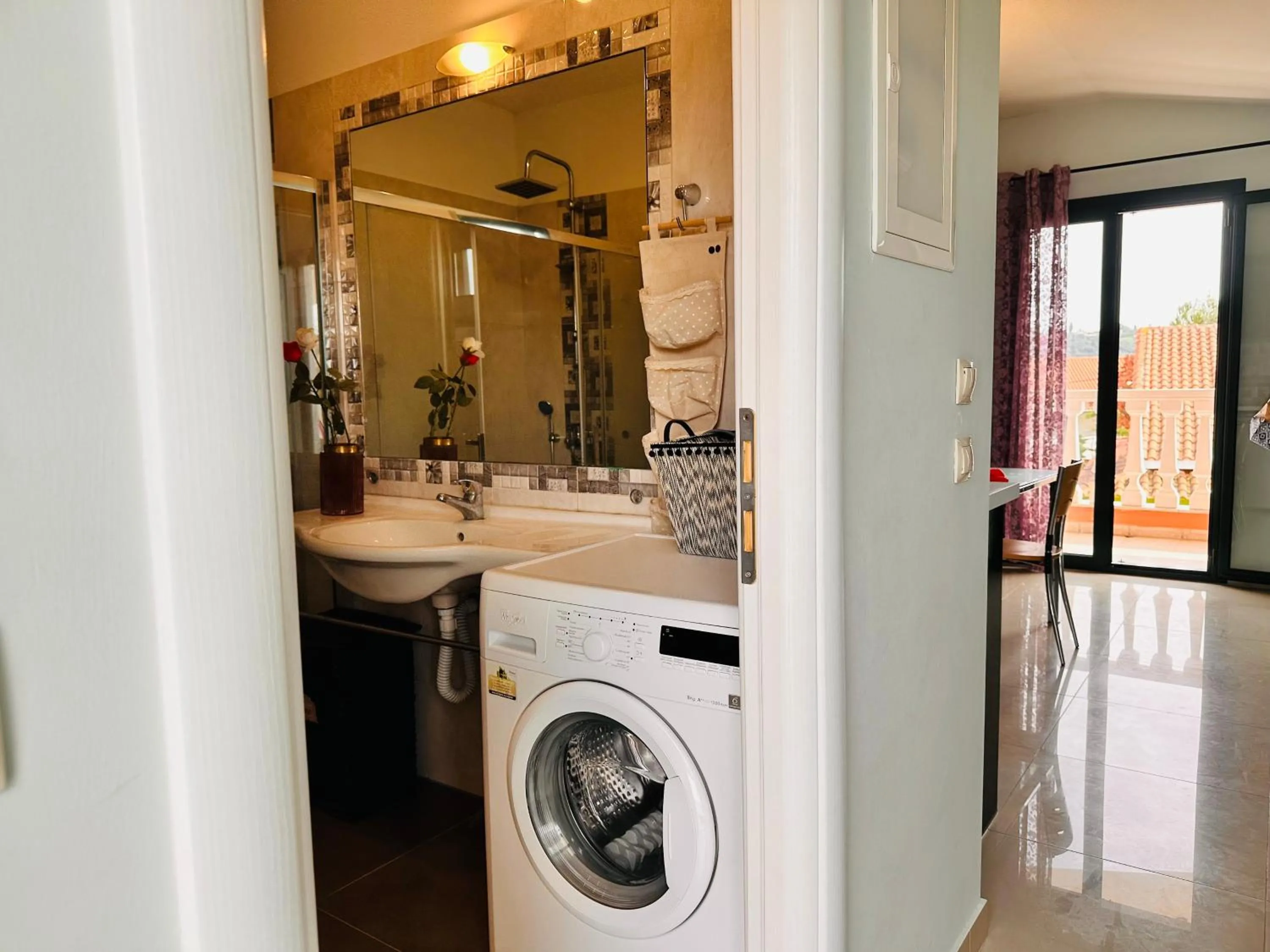 Bathroom in Infinity blue beach apartments - Renovated Apartments 2 Minutes from the Sea & Pool with Scenic Views