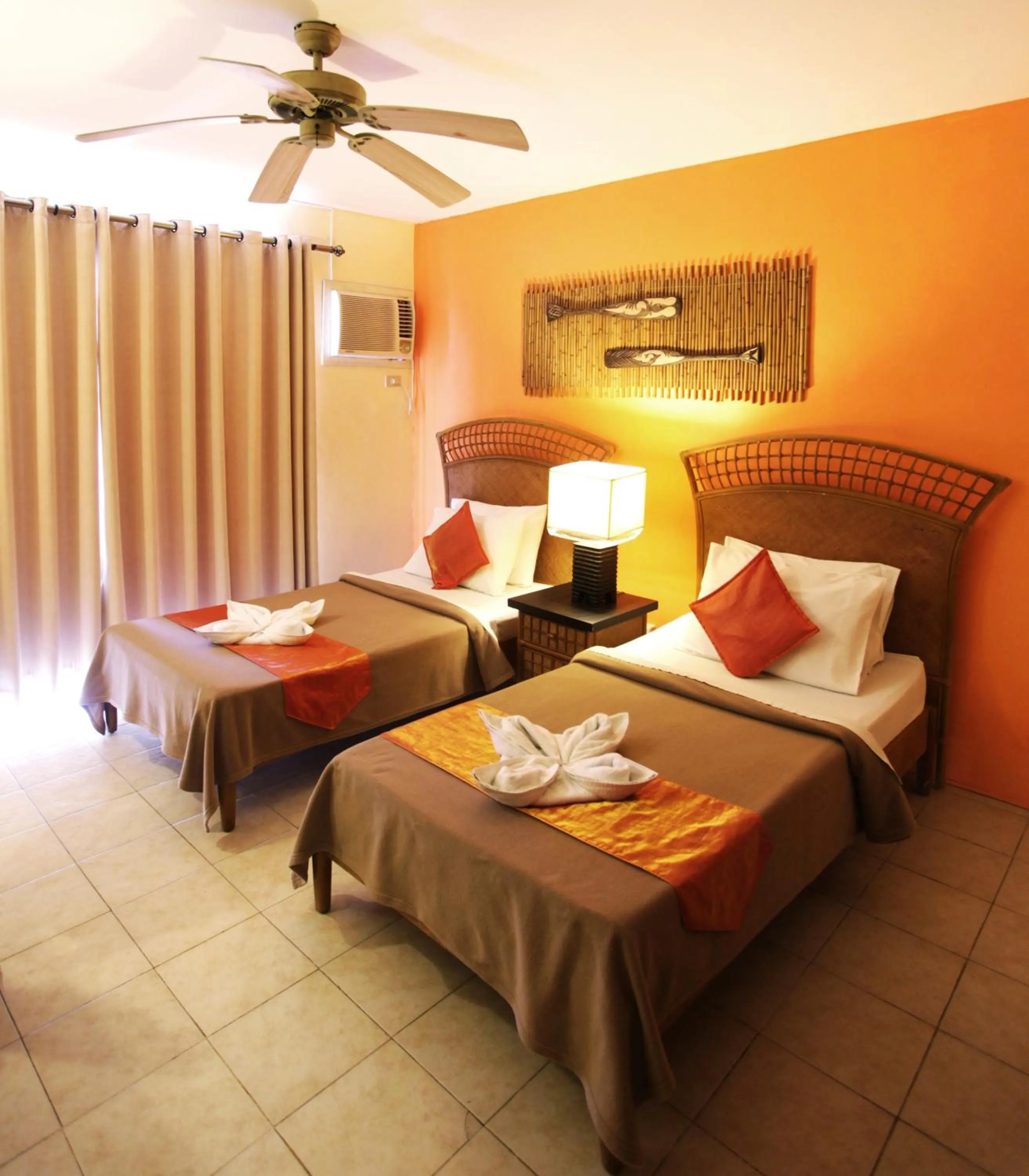 Bed in Eagle Point Beach and Dive Resort