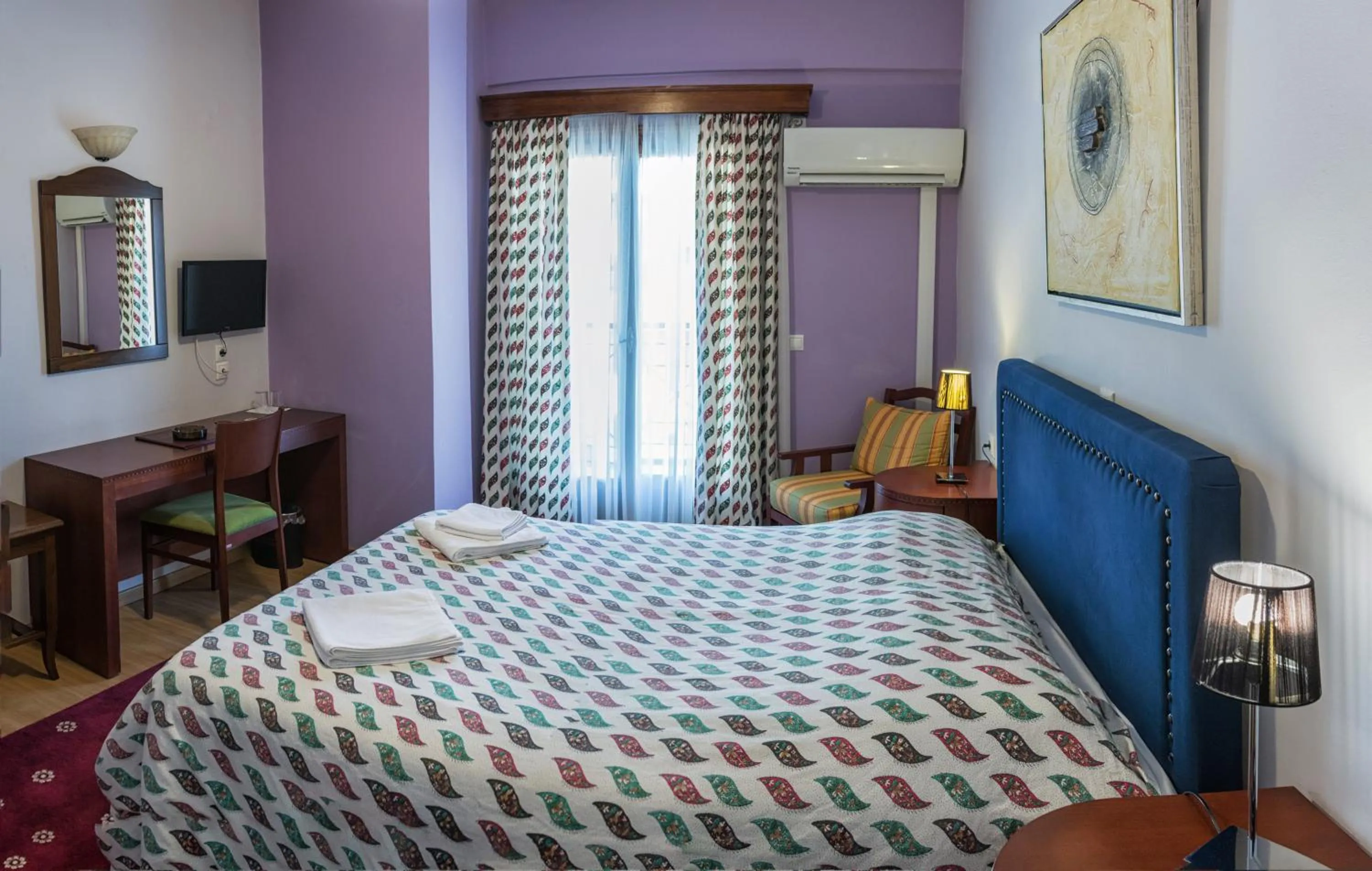 Bed in City Hotel Apollonion