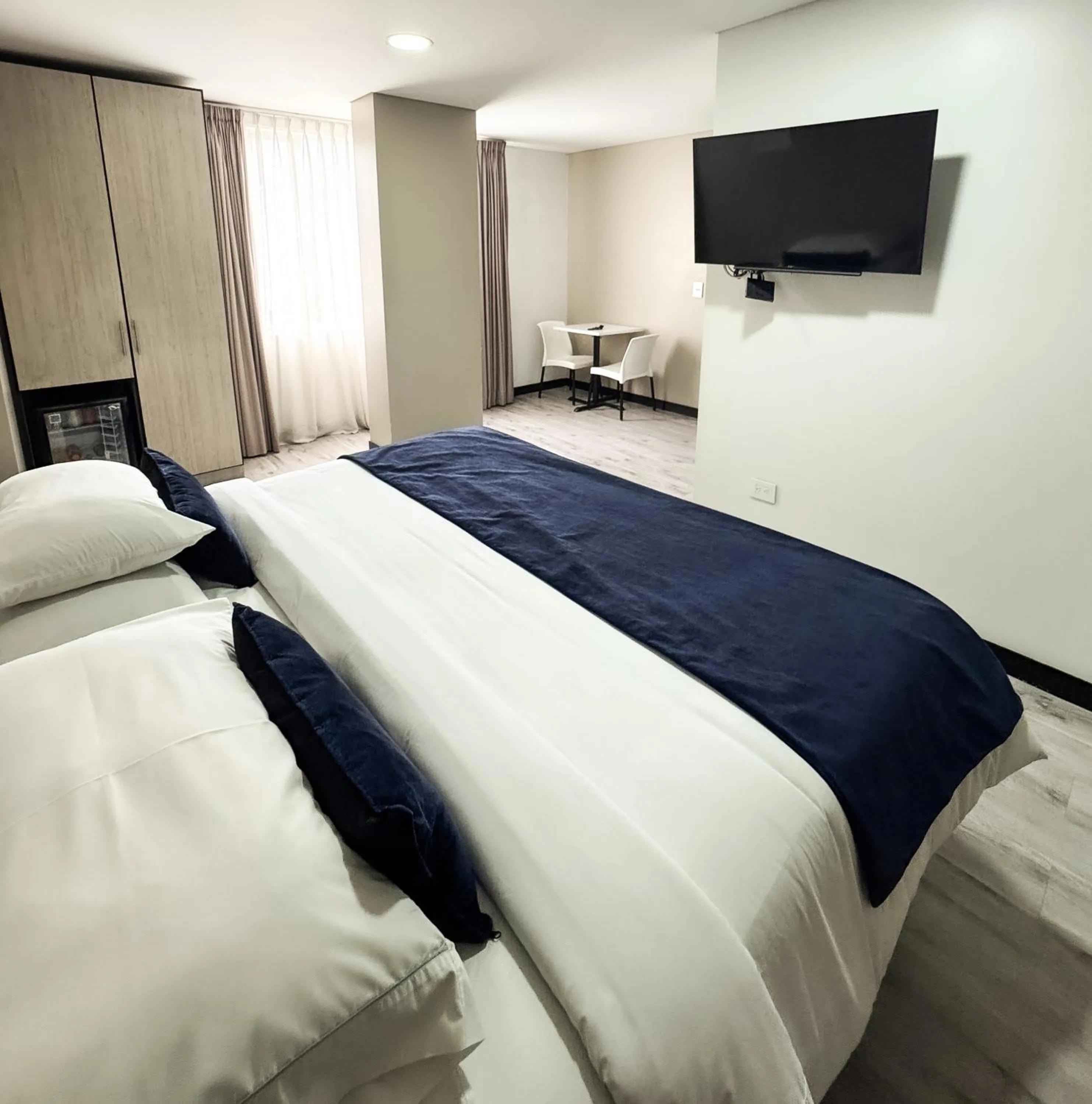 Communal lounge/ TV room, Bed in Hotel WLH Silver Bogota - White Lighthouse