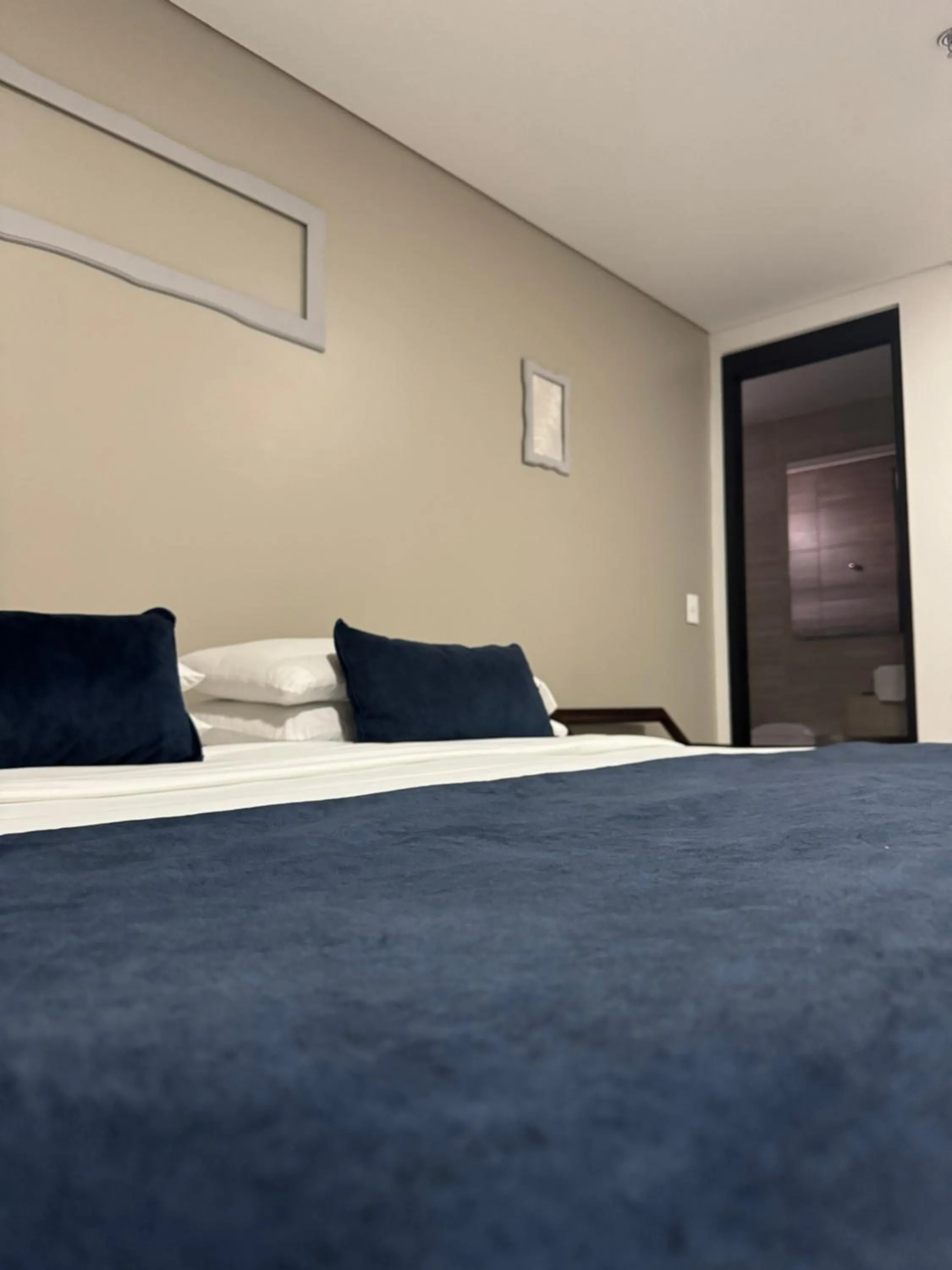 Bed in Hotel WLH Silver Bogota - White Lighthouse