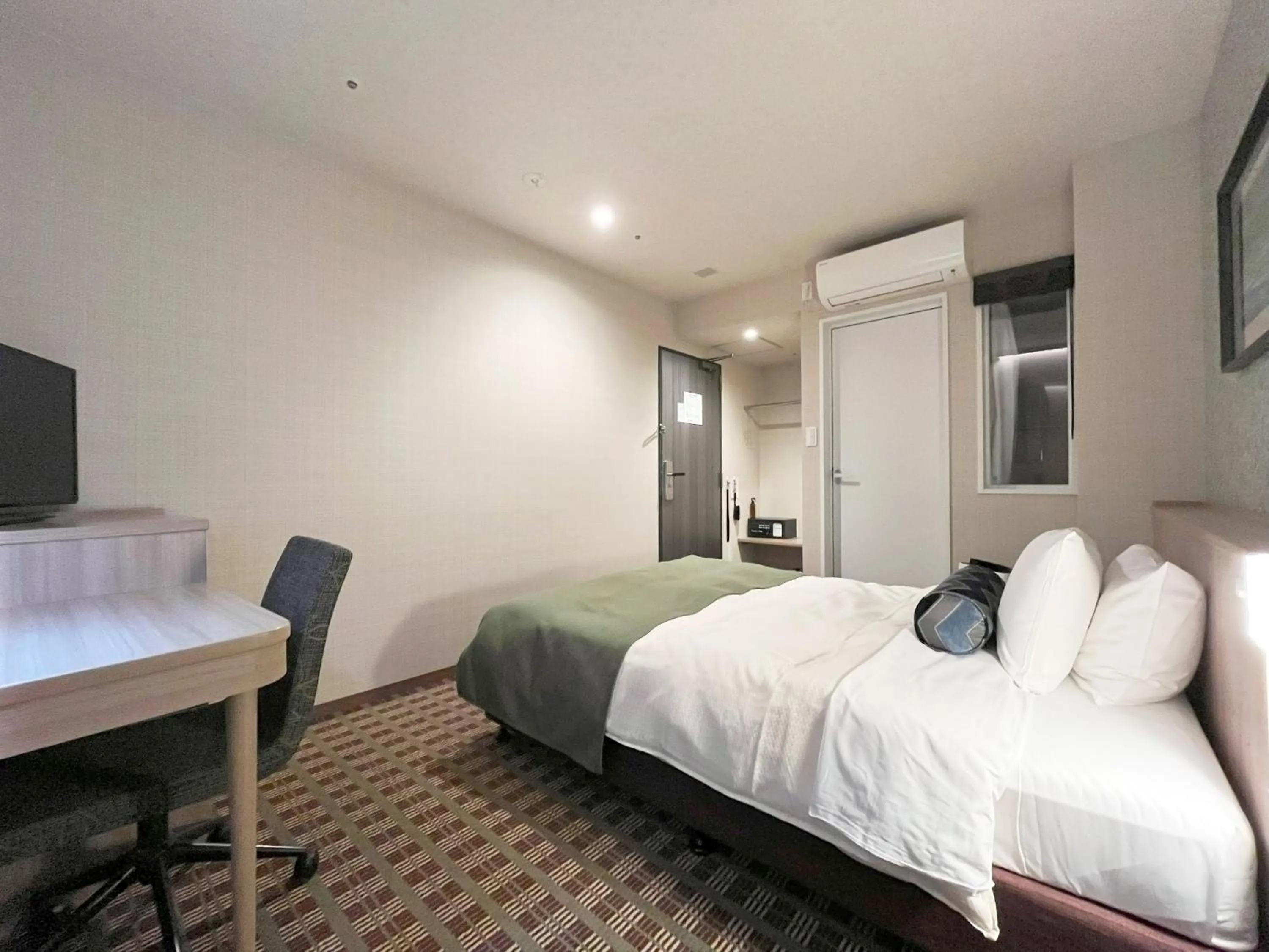 Bed in Garden Hotel Shizuoka