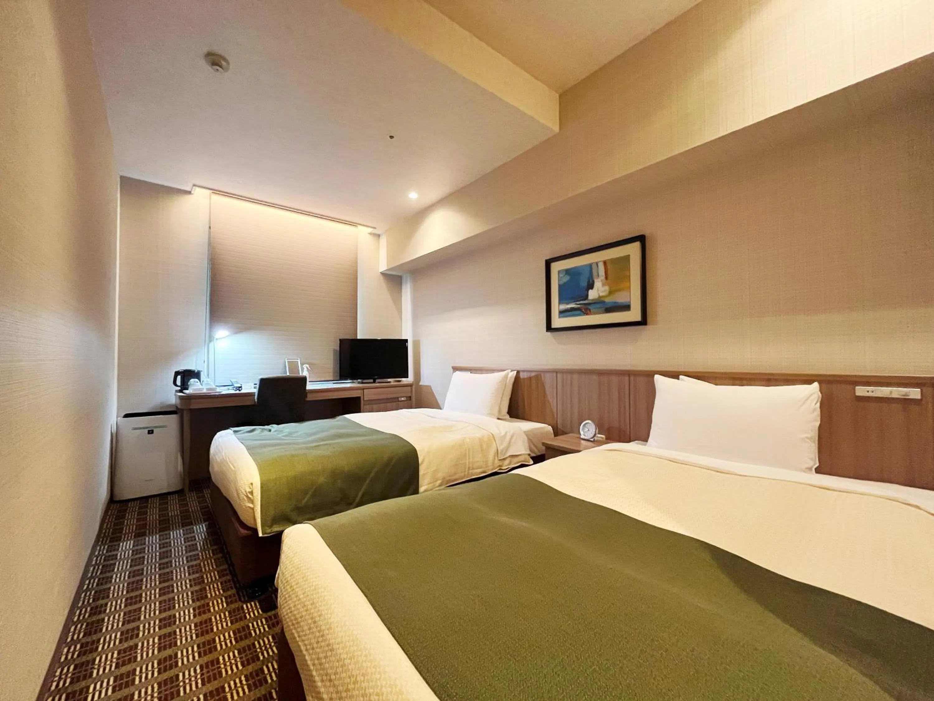 Bed in Garden Hotel Shizuoka