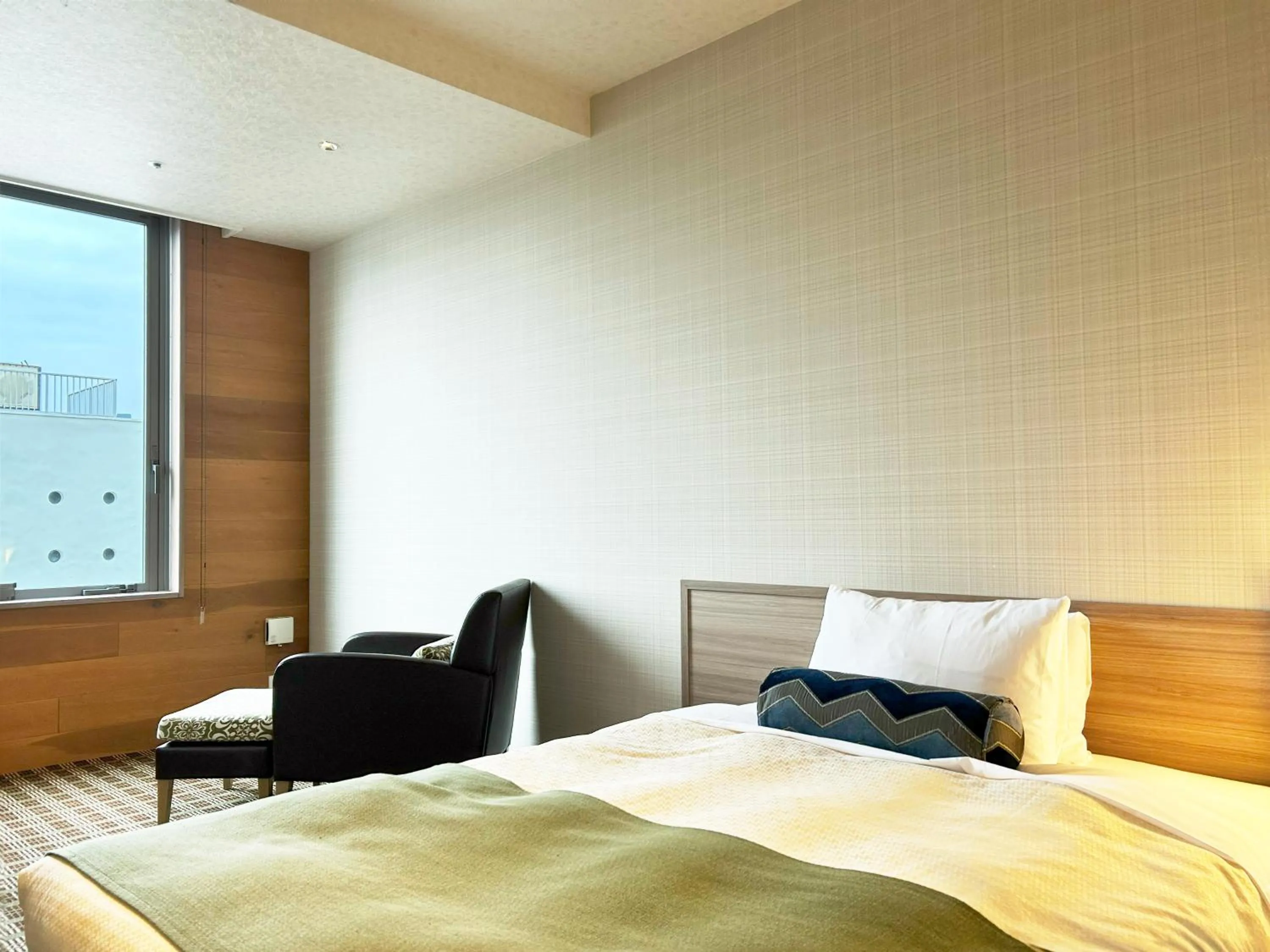 Bed in Garden Hotel Shizuoka