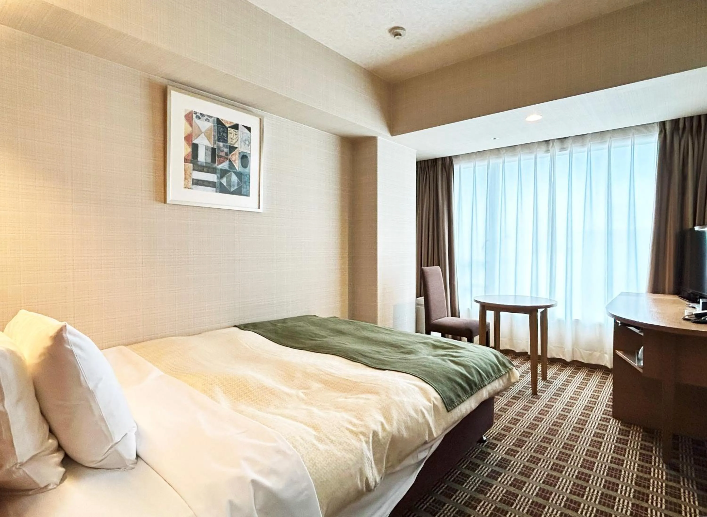 Bed in Garden Hotel Shizuoka