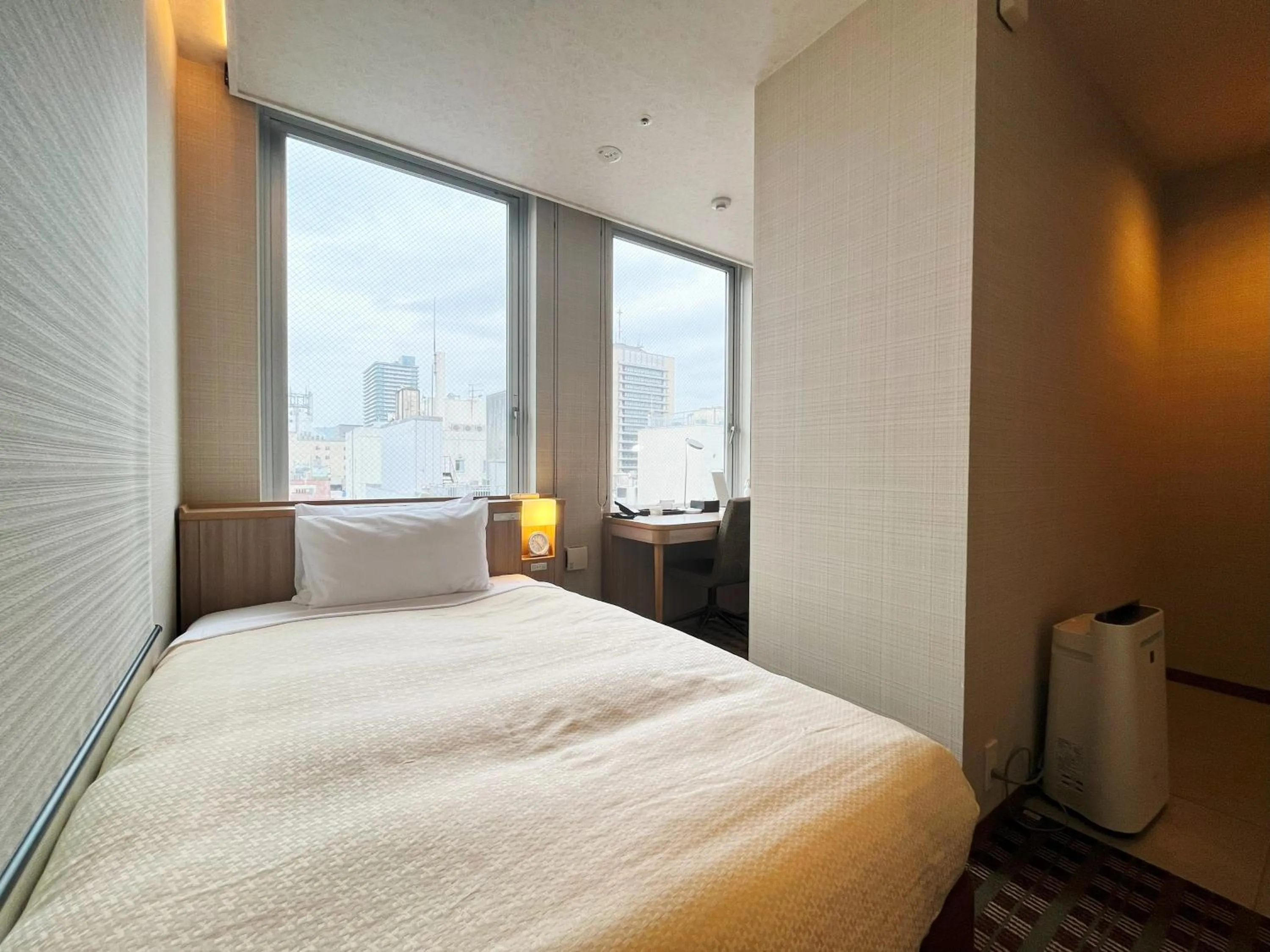 Bed in Garden Hotel Shizuoka