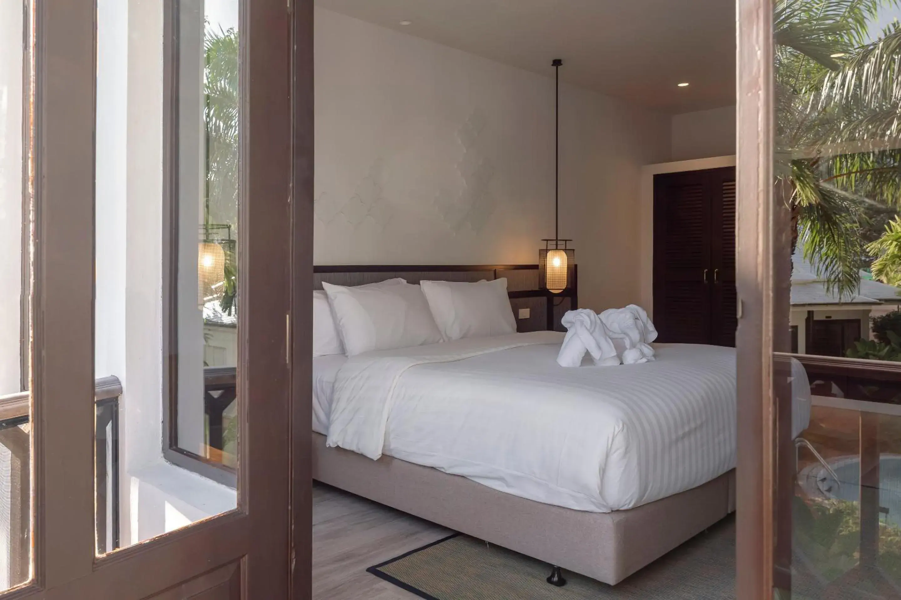 Bed in The Pe La Resort, Phuket - SHA Extra Plus Bed in The Pe La Resort, Phuket - SHA Extra Plus