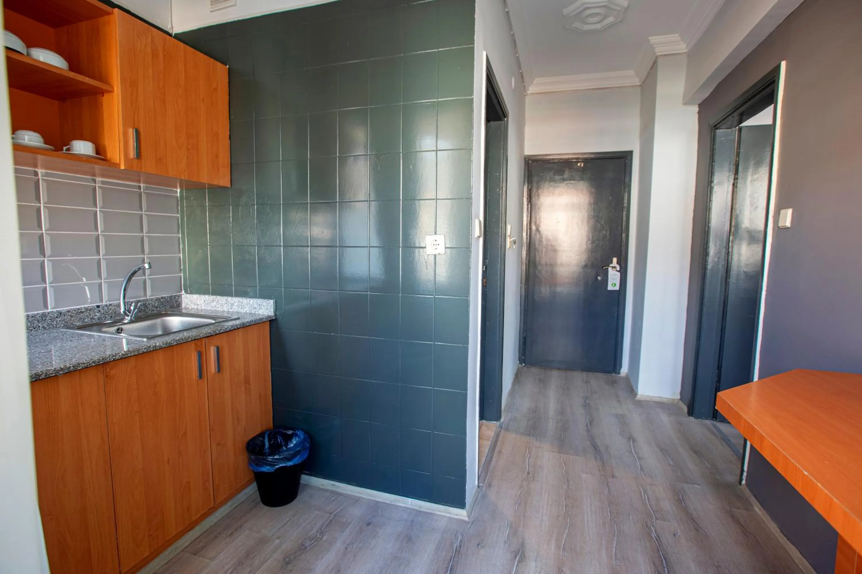 Kitchen or kitchenette in HMA Hotel & Suites