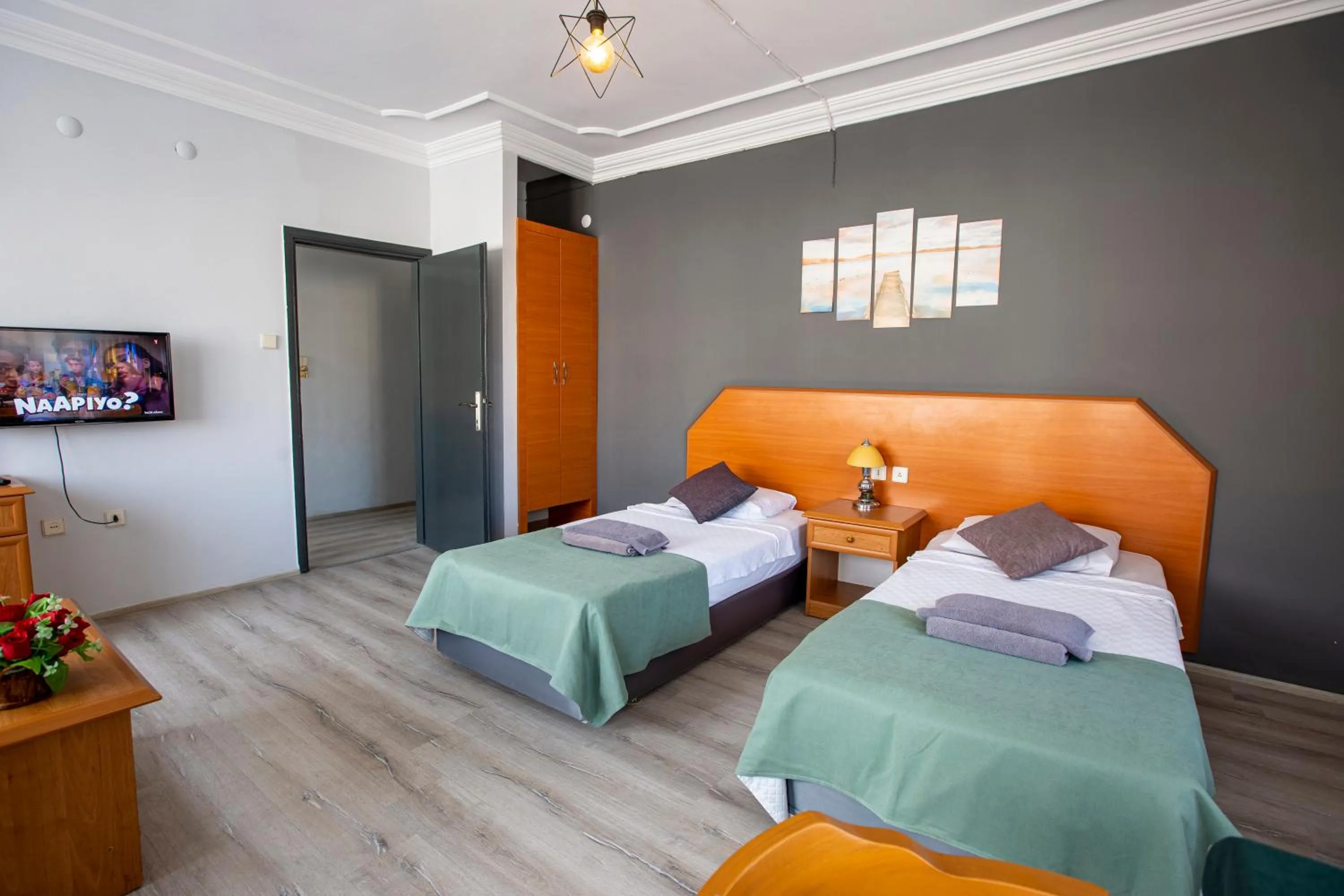 Bed in HMA Hotel & Suites