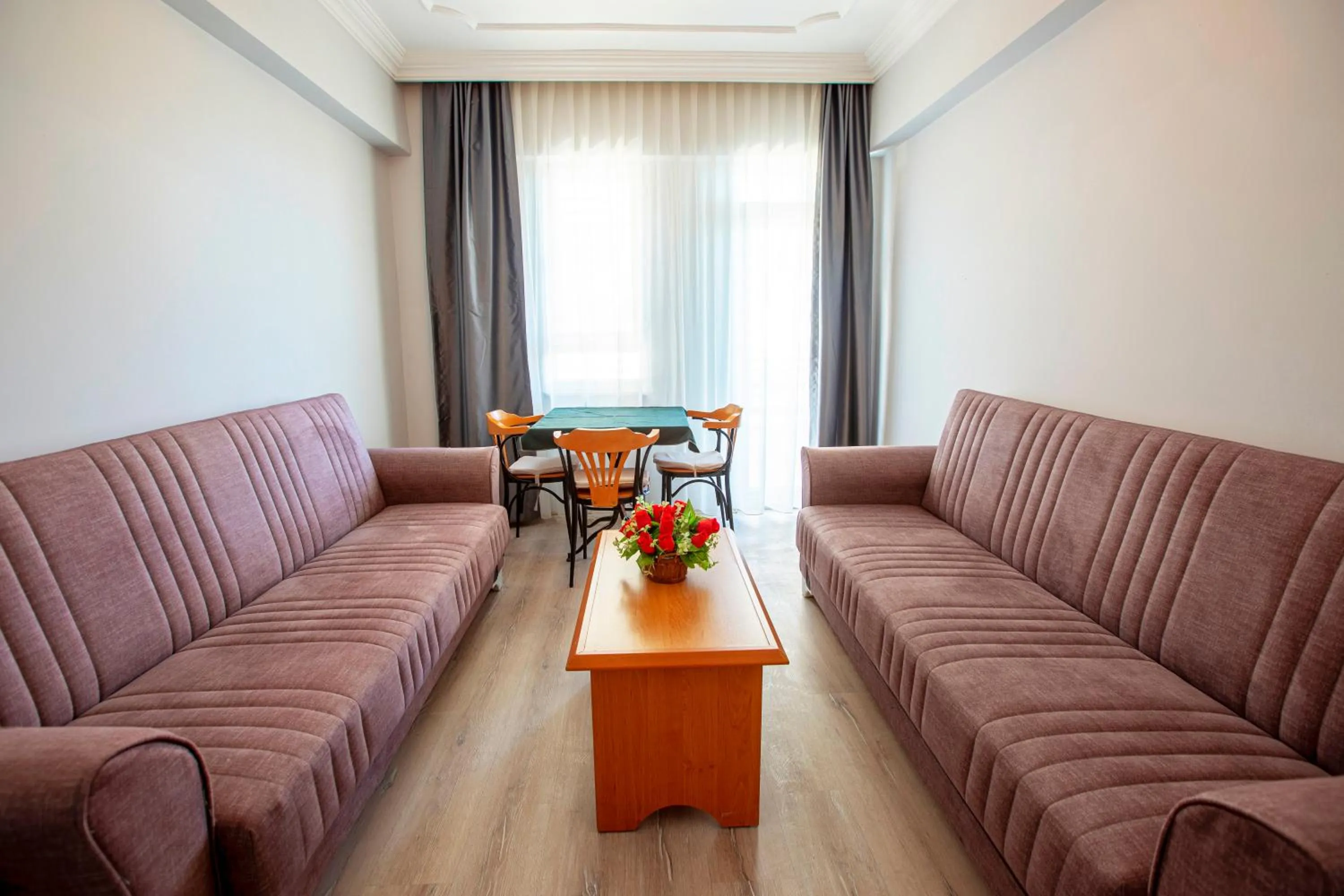 Living room in HMA Hotel & Suites