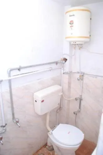 Toilet in Karina art Home stay