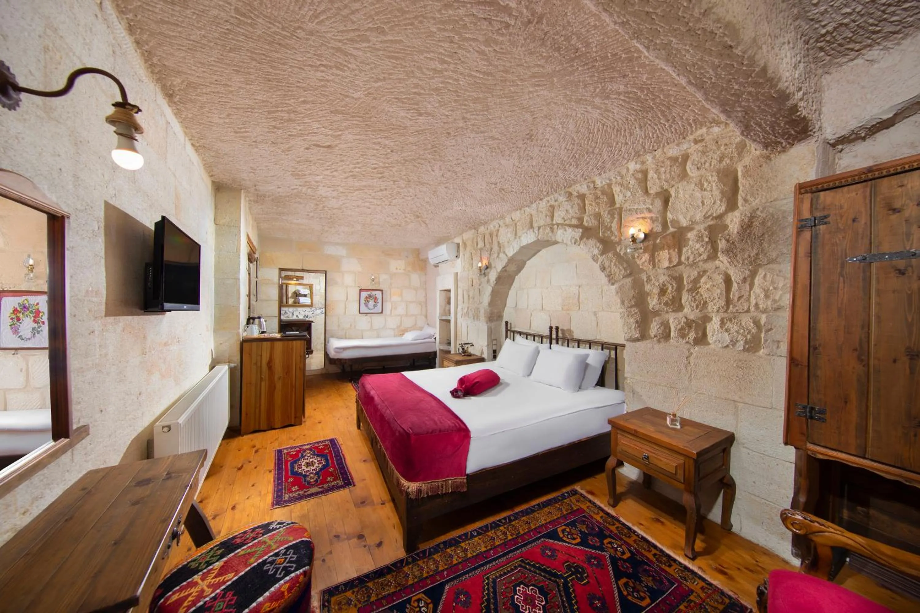 Bed in Aja Cappadocia Cave Hotel